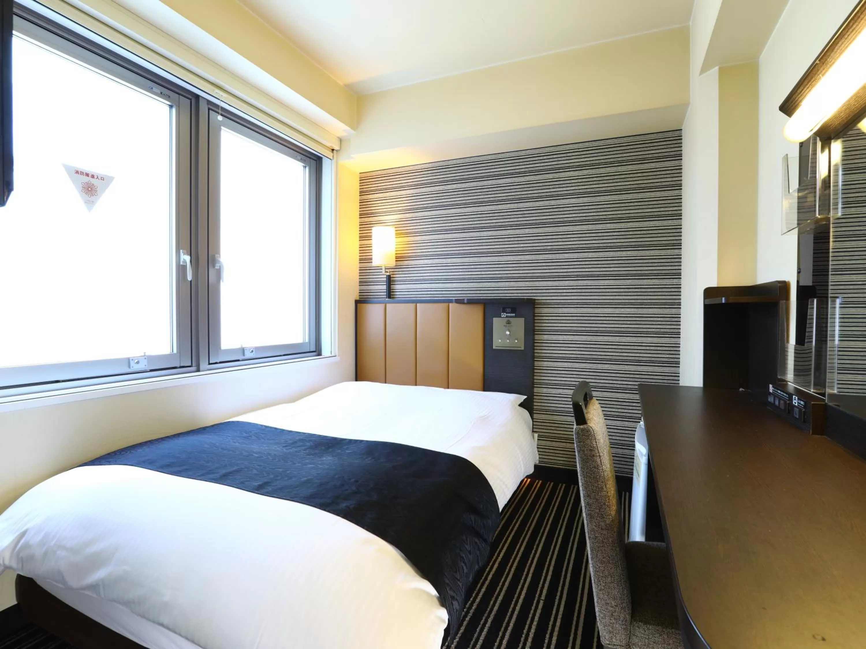 Photo of the whole room, Bed in APA Hotel Shibuya Dogenzakaue