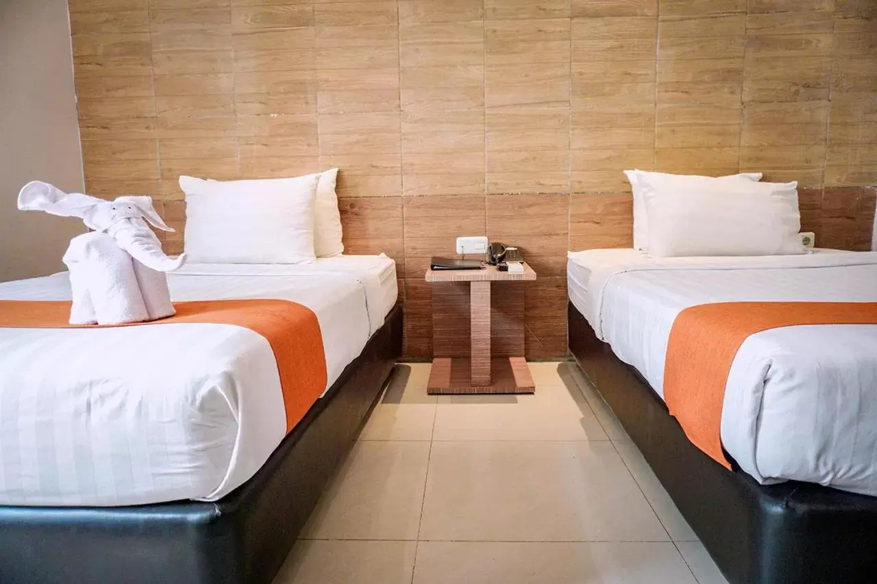 Bed in Andelir Hotel Simpang Lima Semarang