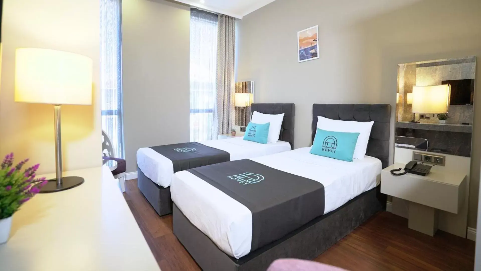 TV and multimedia, Bed in Homey AirPort Hotel TV and multimedia, Bed in Homey AirPort Hotel