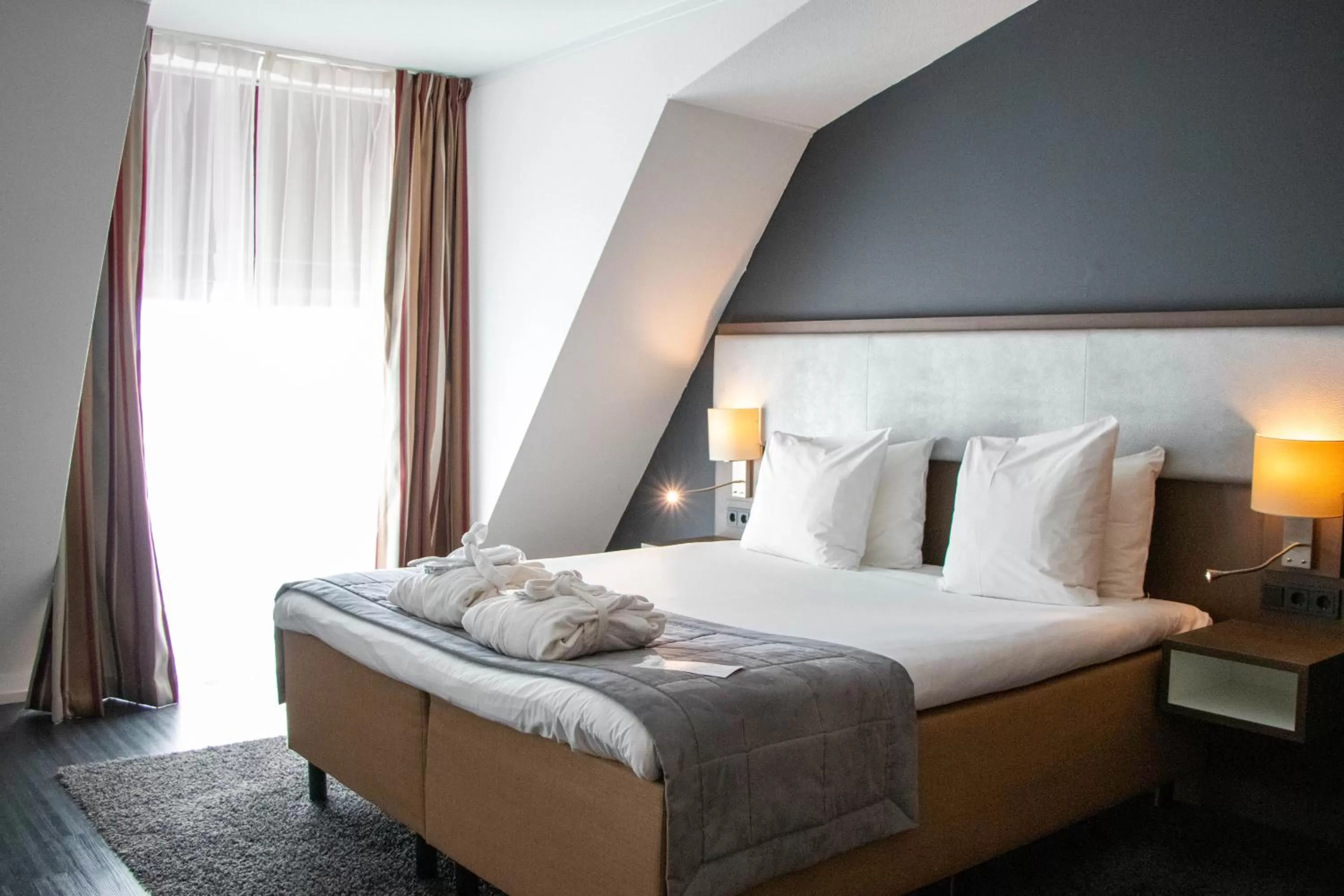 Bed in City Hotel Gouda, WorldHotels Crafted Collection