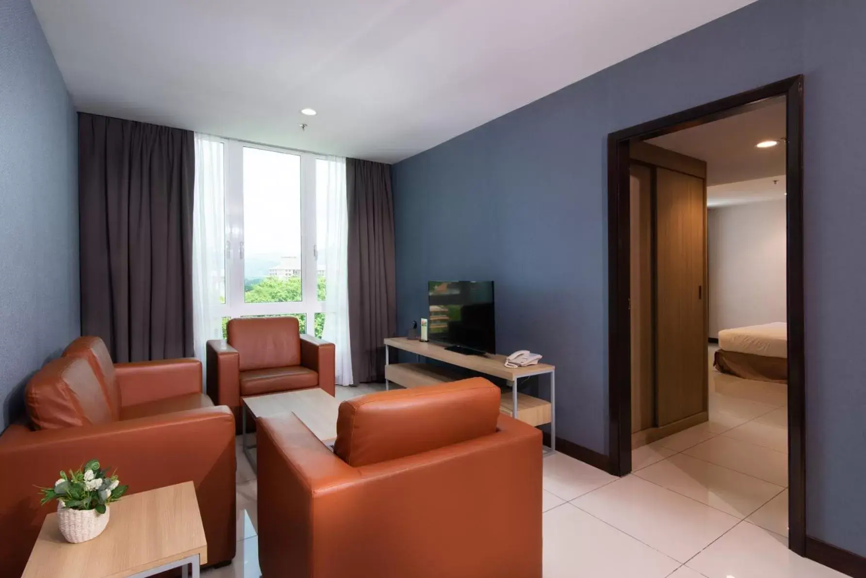 TV and multimedia, Seating Area in One Pacific Hotel and Serviced Apartments