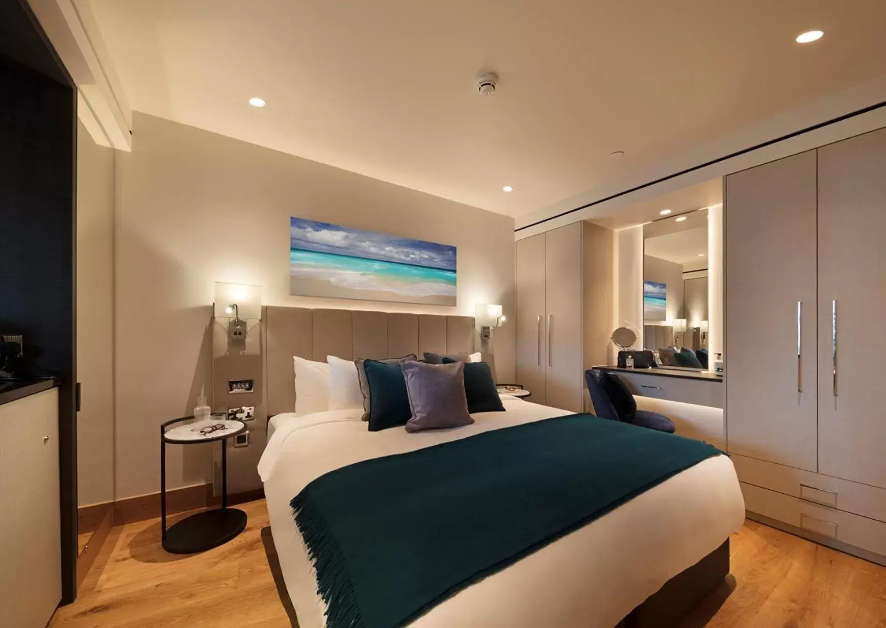 Bed in Tower Suites by Blue Orchid