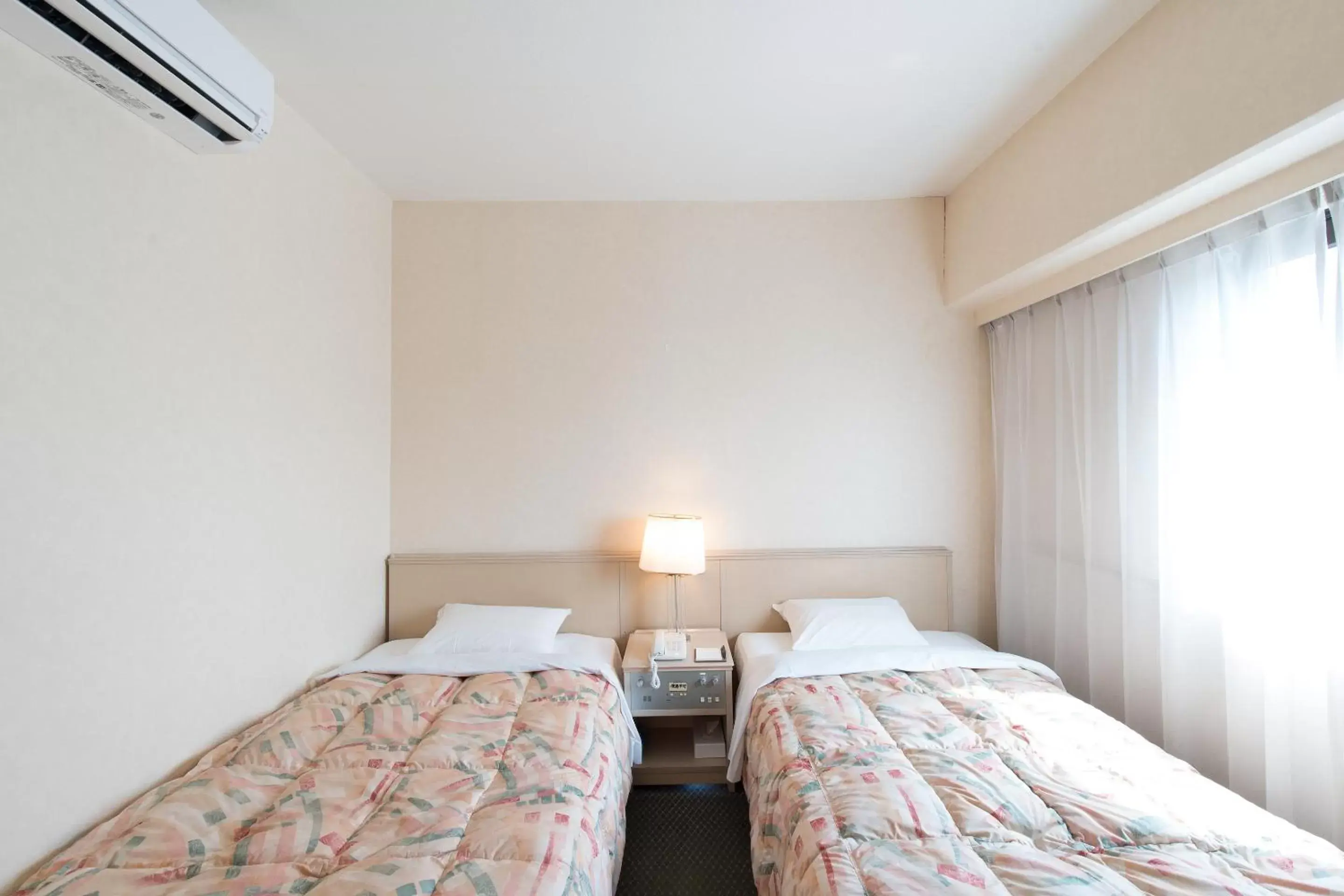 Photo of the whole room, Bed in Tabist Hotel Tetora Kitakyushu