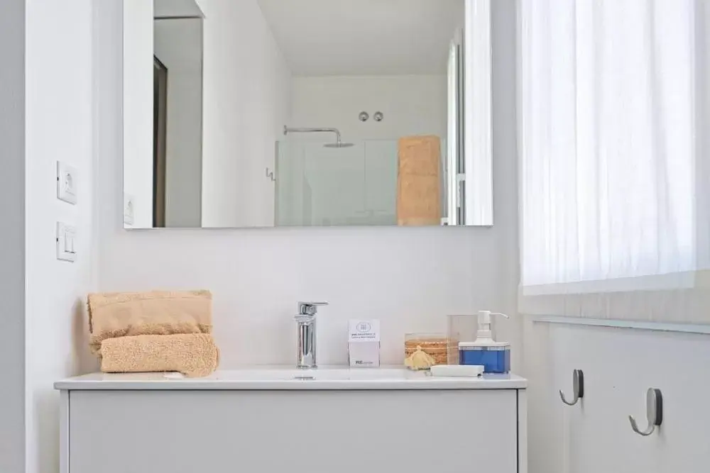 Bathroom in Amare Suite & Apartments