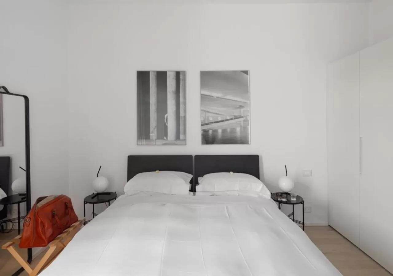 Bed in BB Hotels Aparthotel Collection Il Michelangelo