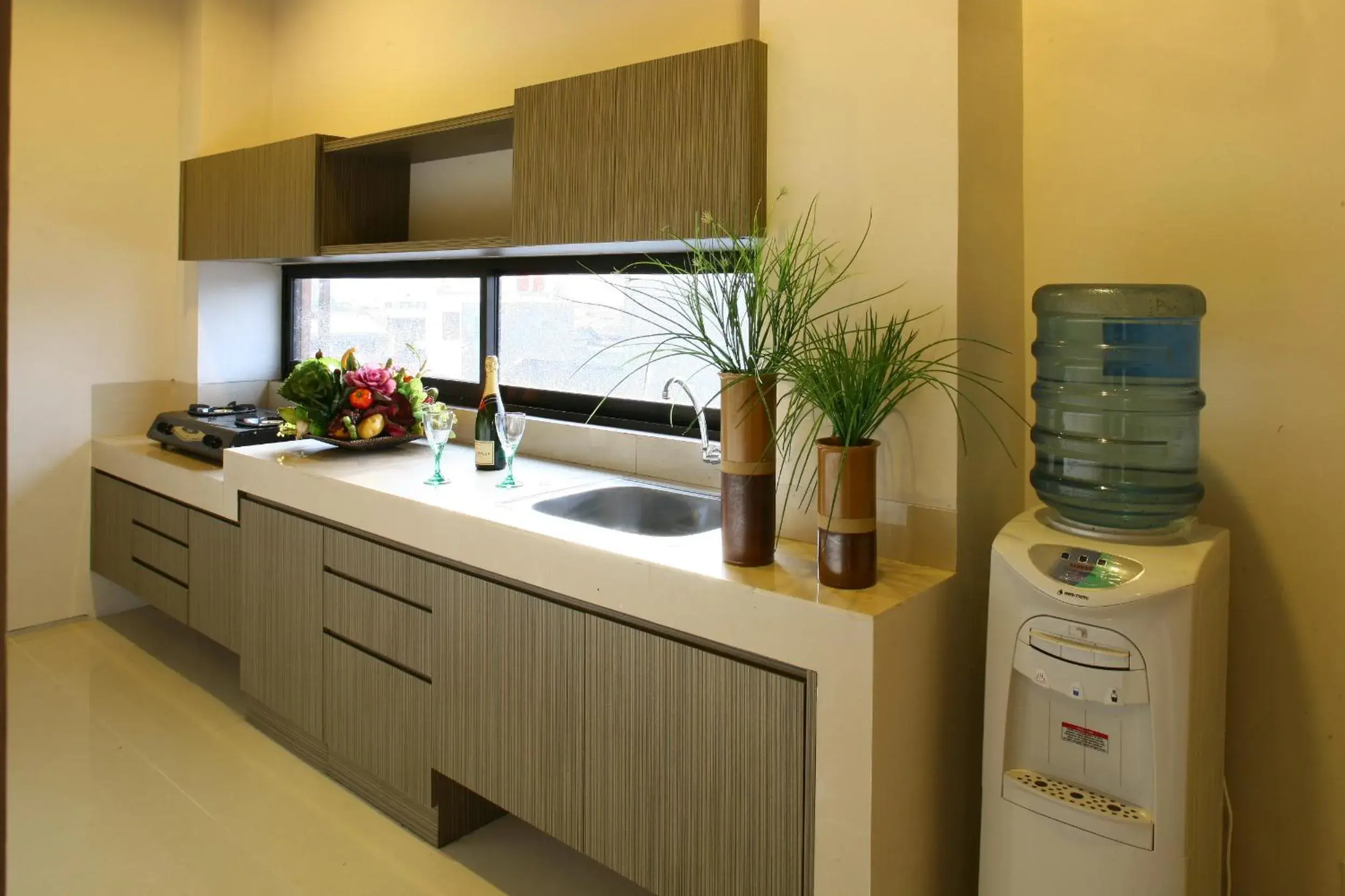 Kitchen or kitchenette, Kitchen/Kitchenette in Rasuna Mansion