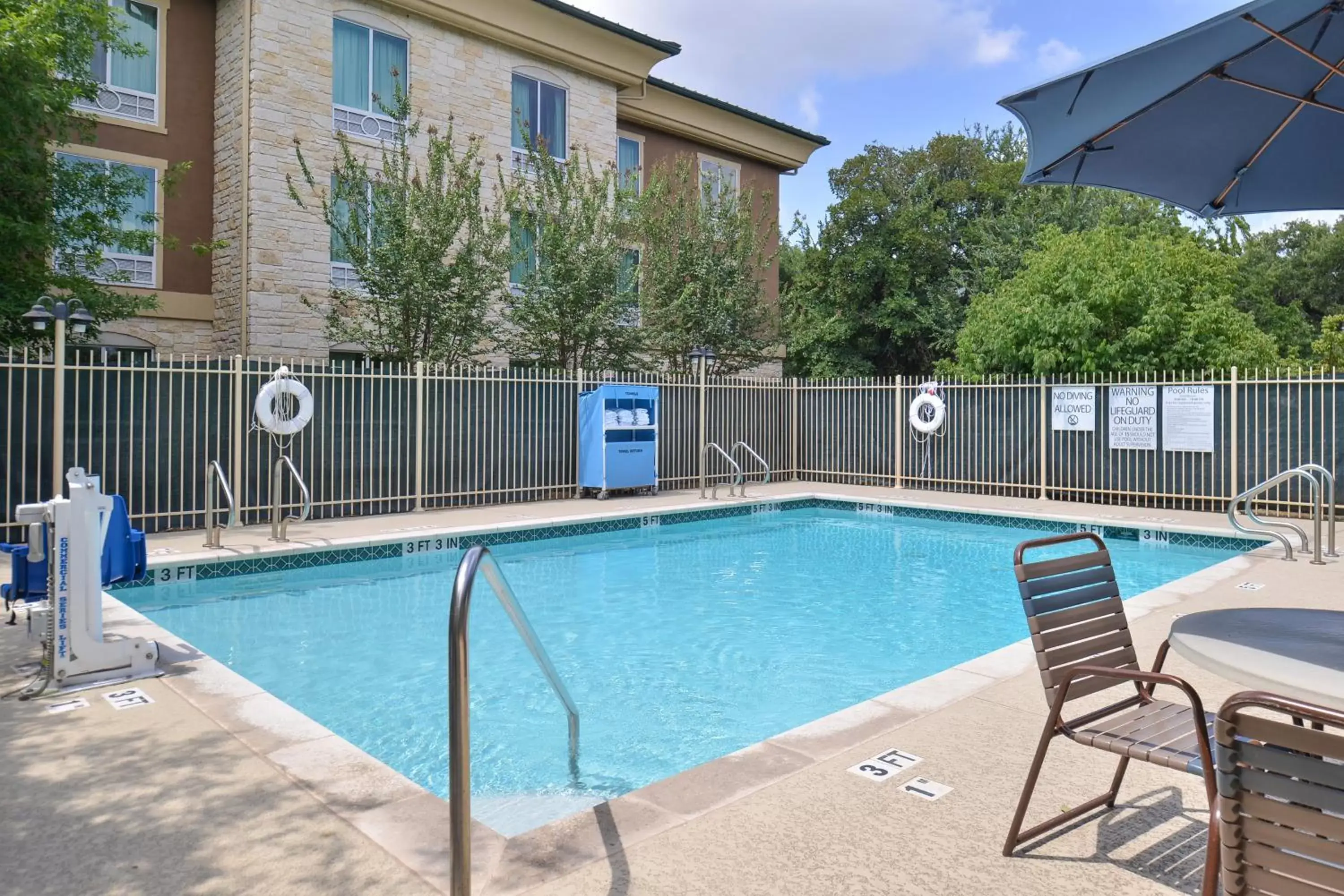 Swimming Pool in Holiday Inn Express Hotel & Suites Austin SW - Sunset Valley, an IHG Hotel