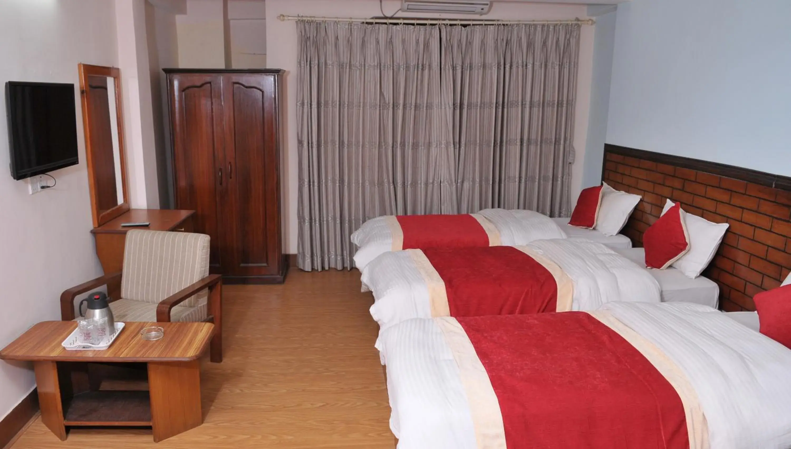 Photo of the whole room, Bed in Hotel Brihaspati