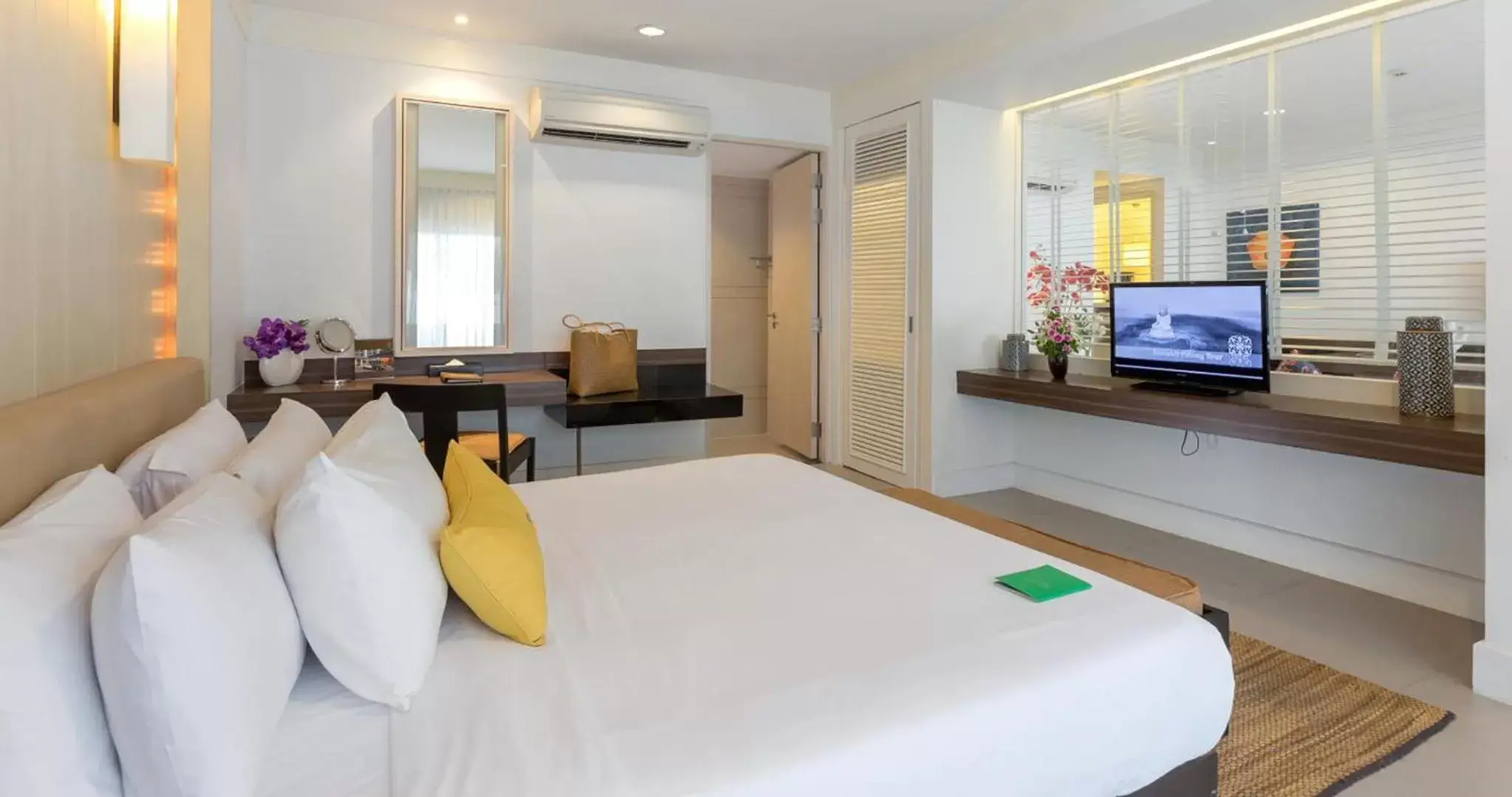 Bed in Sawaddi Patong Resort & Spa by Tolani - SHA Extra Plus