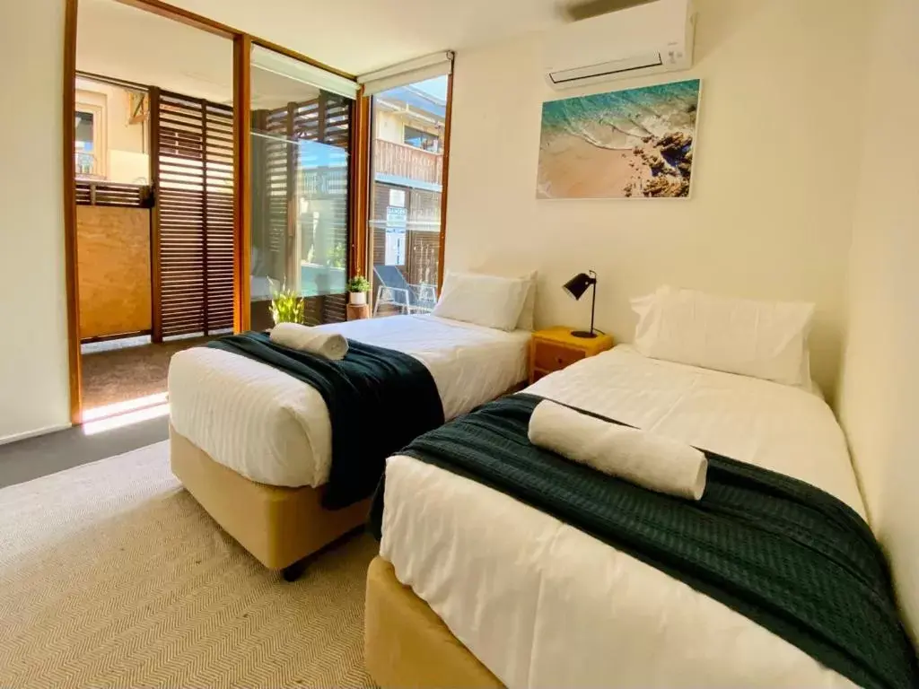 Bedroom, Bed in Byron Butter Factory Apartments