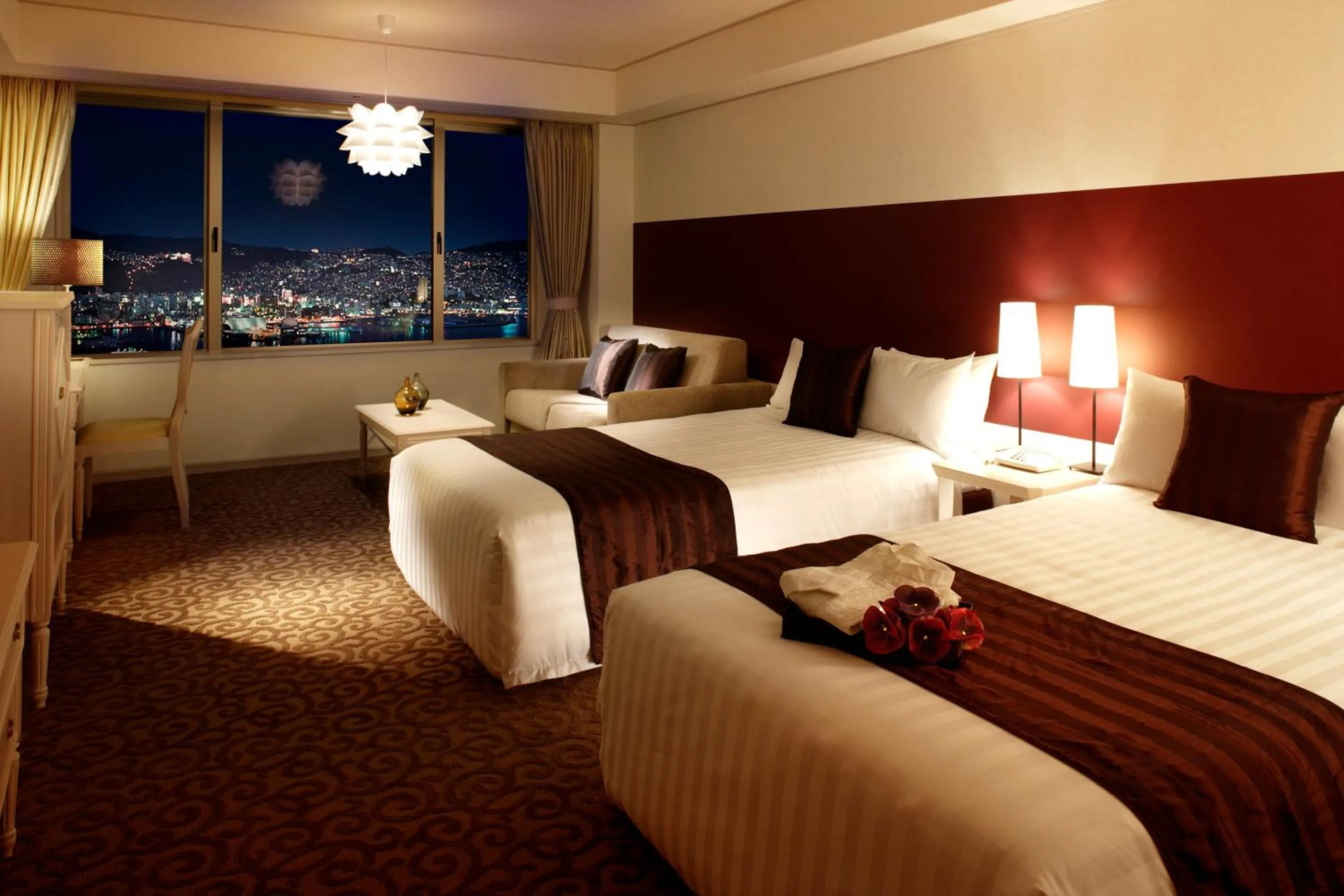 Bed in Luke Plaza Hotel