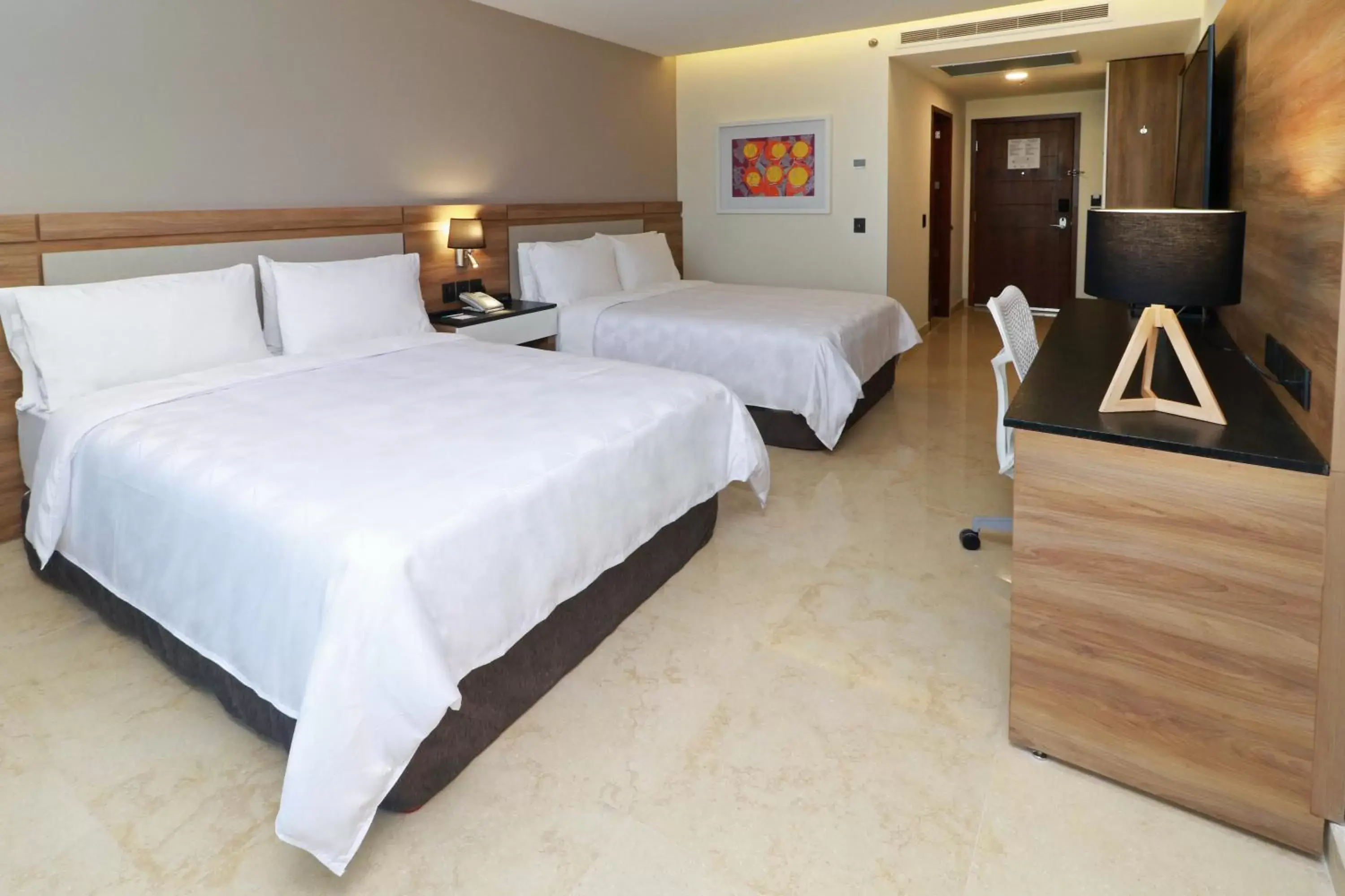 Photo of the whole room, Bed in Holiday Inn & Suites - Puerto Vallarta Marina & Golf, an IHG Hotel