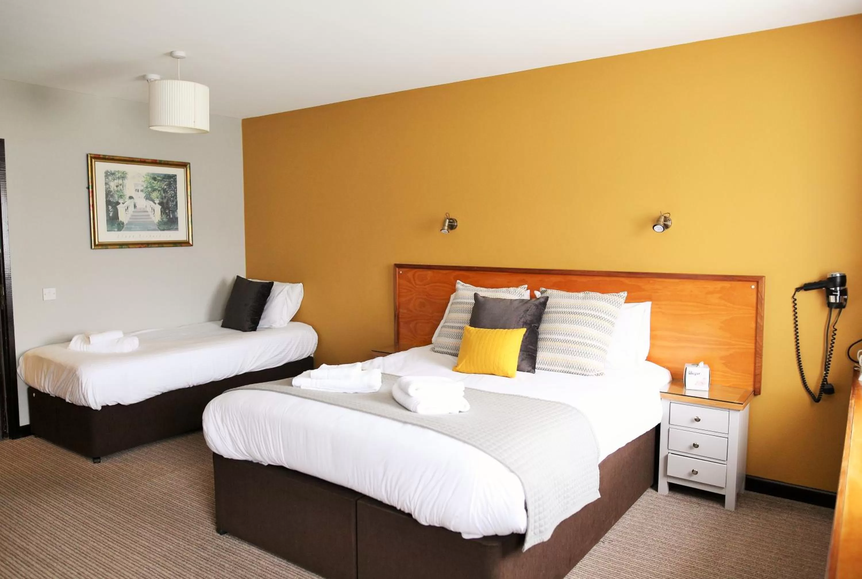 Bed in Tricky's Hotel