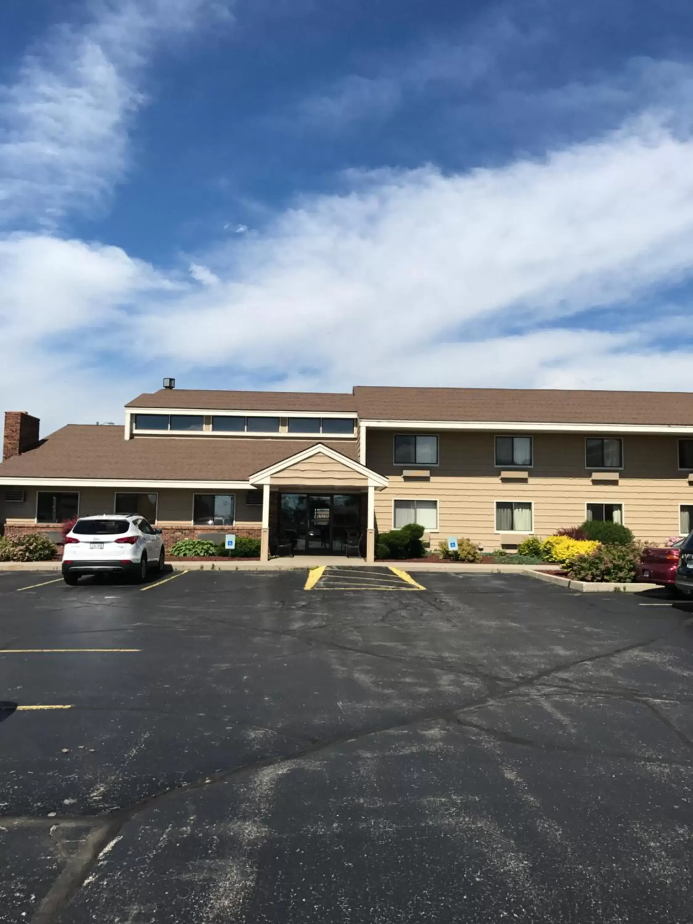 Property Building in AmericInn by Wyndham West Bend