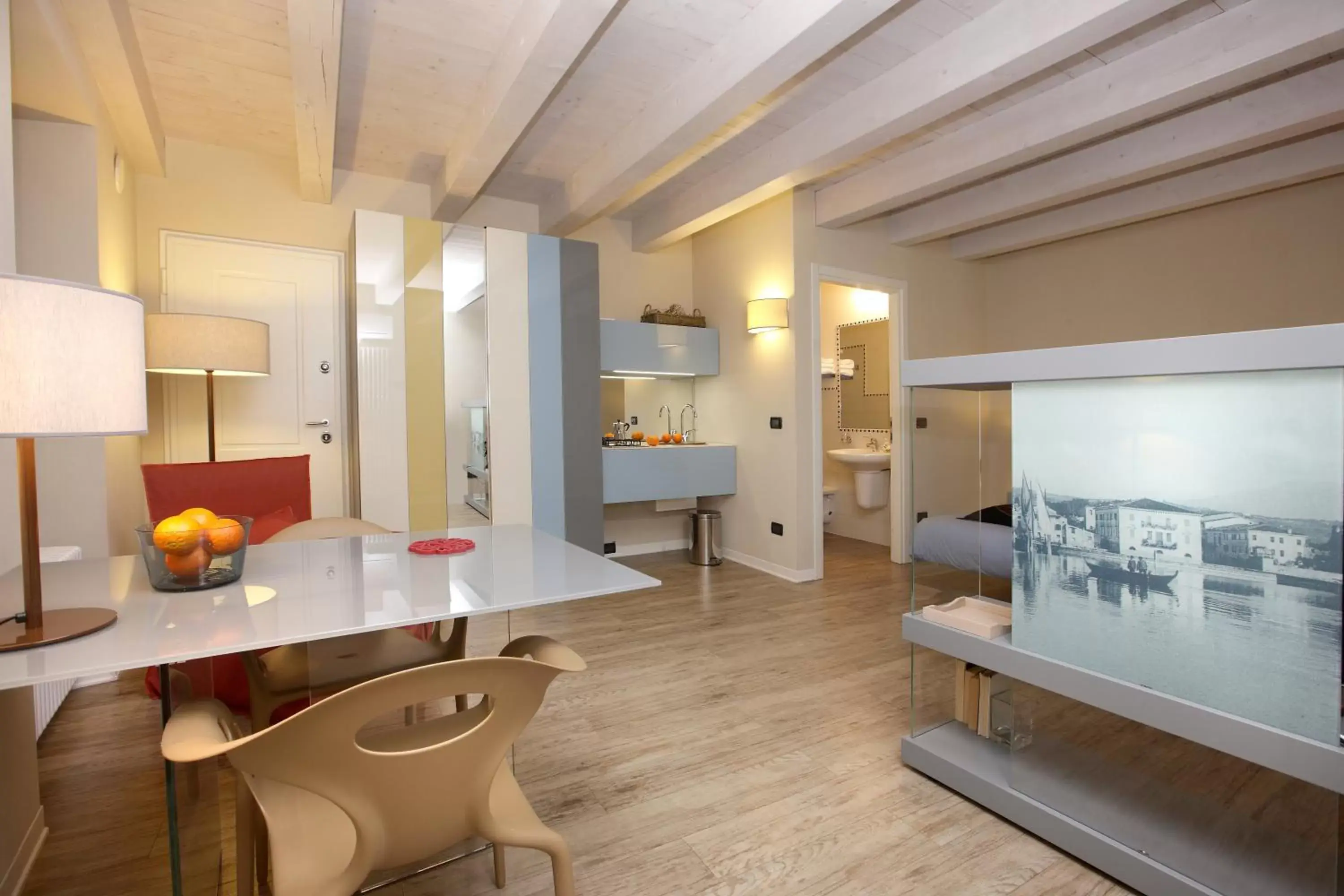 Photo of the whole room, Kitchen/Kitchenette in Corte San Luca Apartments