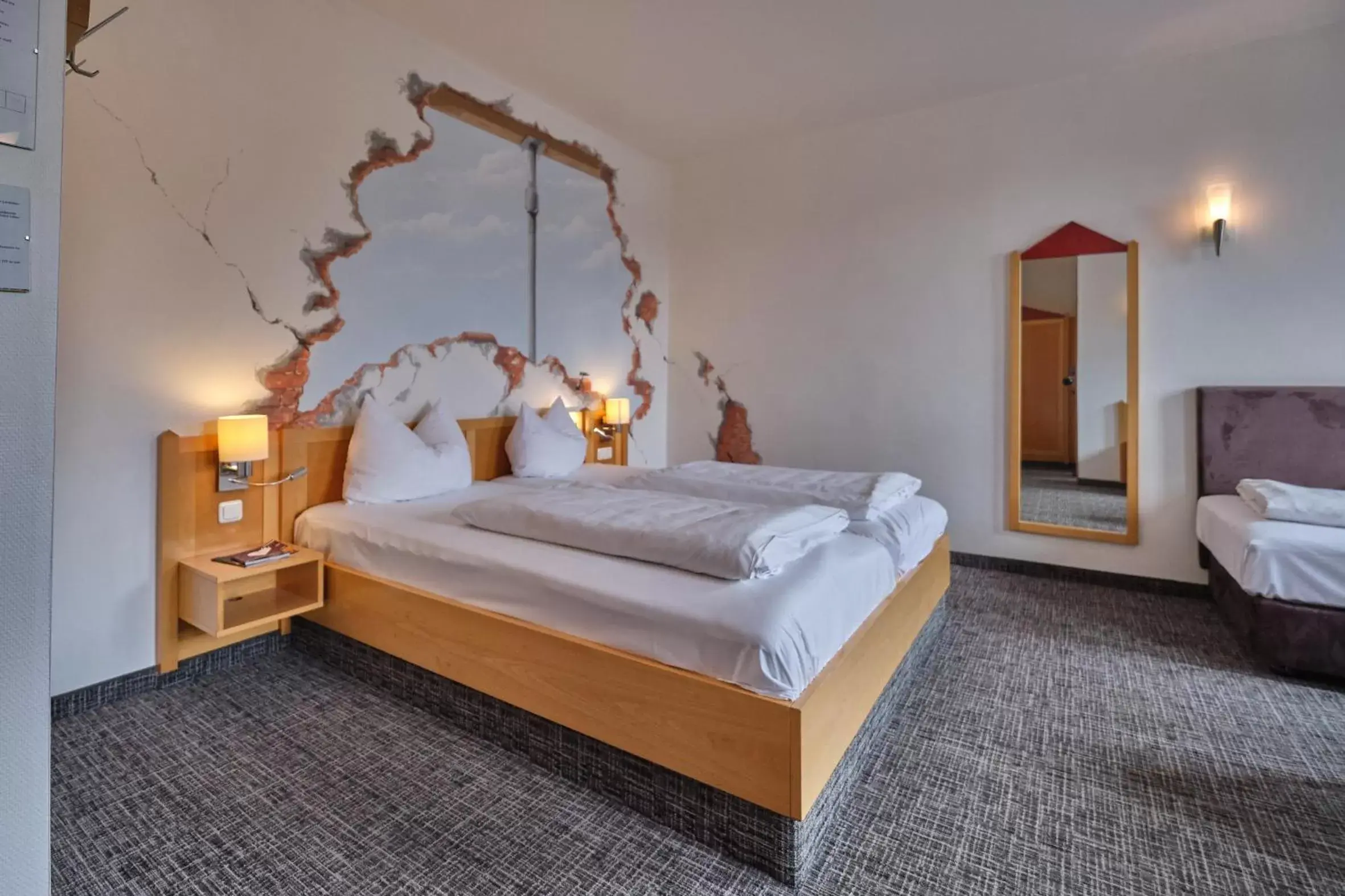 Bed in Hotel Roter Hahn