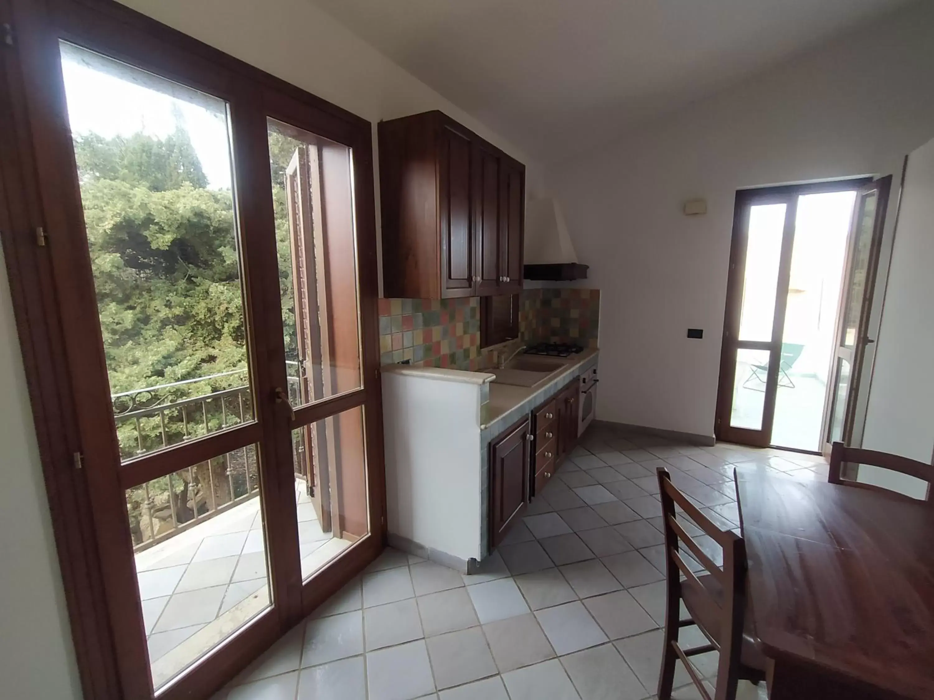 Living room, Kitchen/Kitchenette in SanVitoTour- Residence Il Baglio