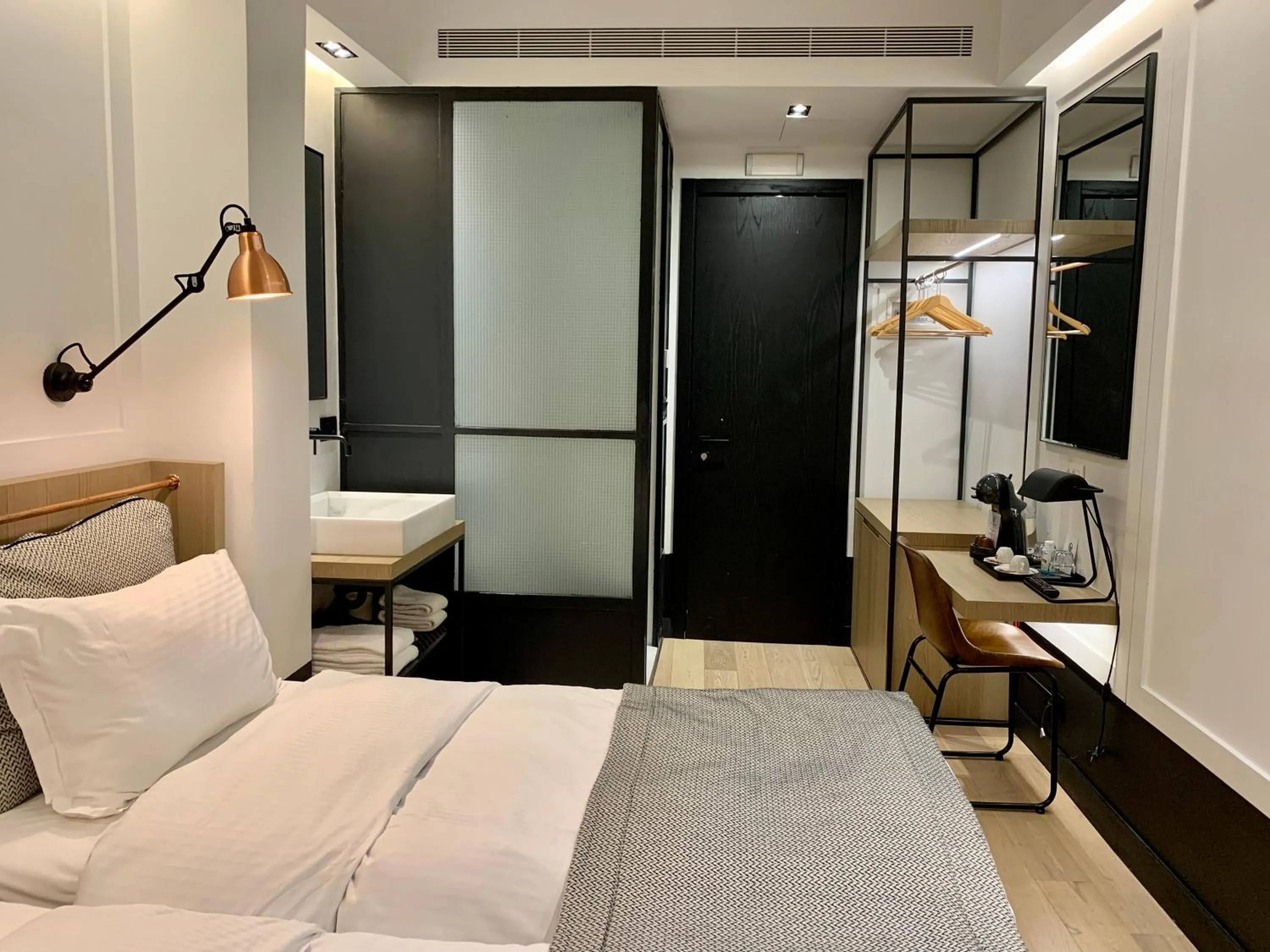 Bed in Niki Athens Hotel