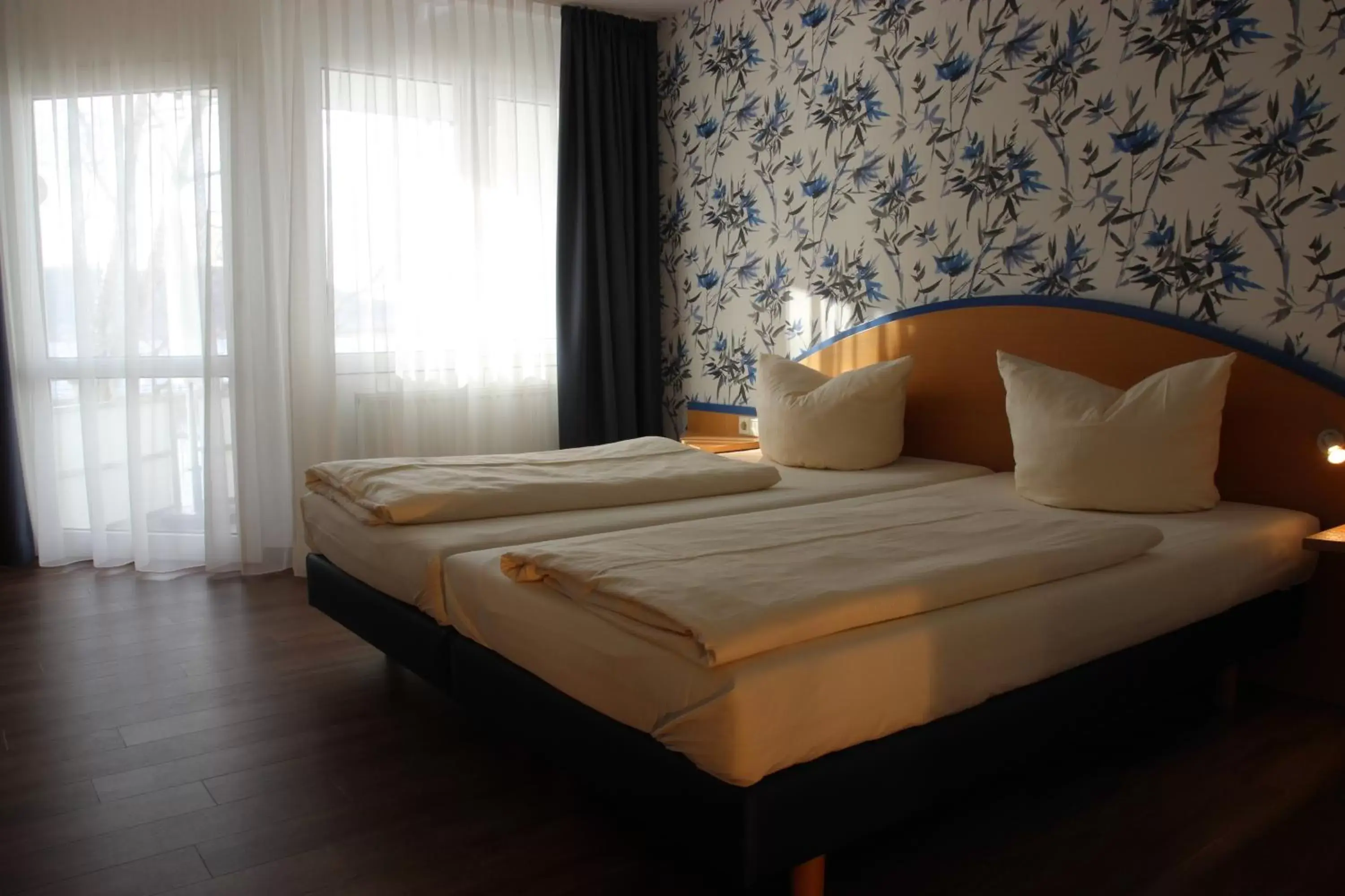 Photo of the whole room, Bed in Seehotel Adler