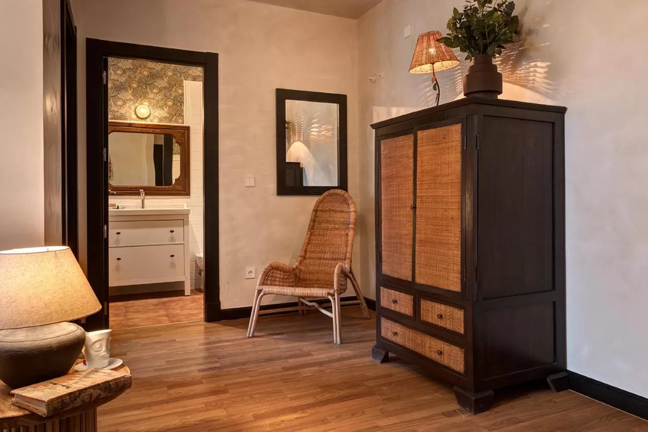 Bed, Seating Area in Hospedium Hotel La Farm