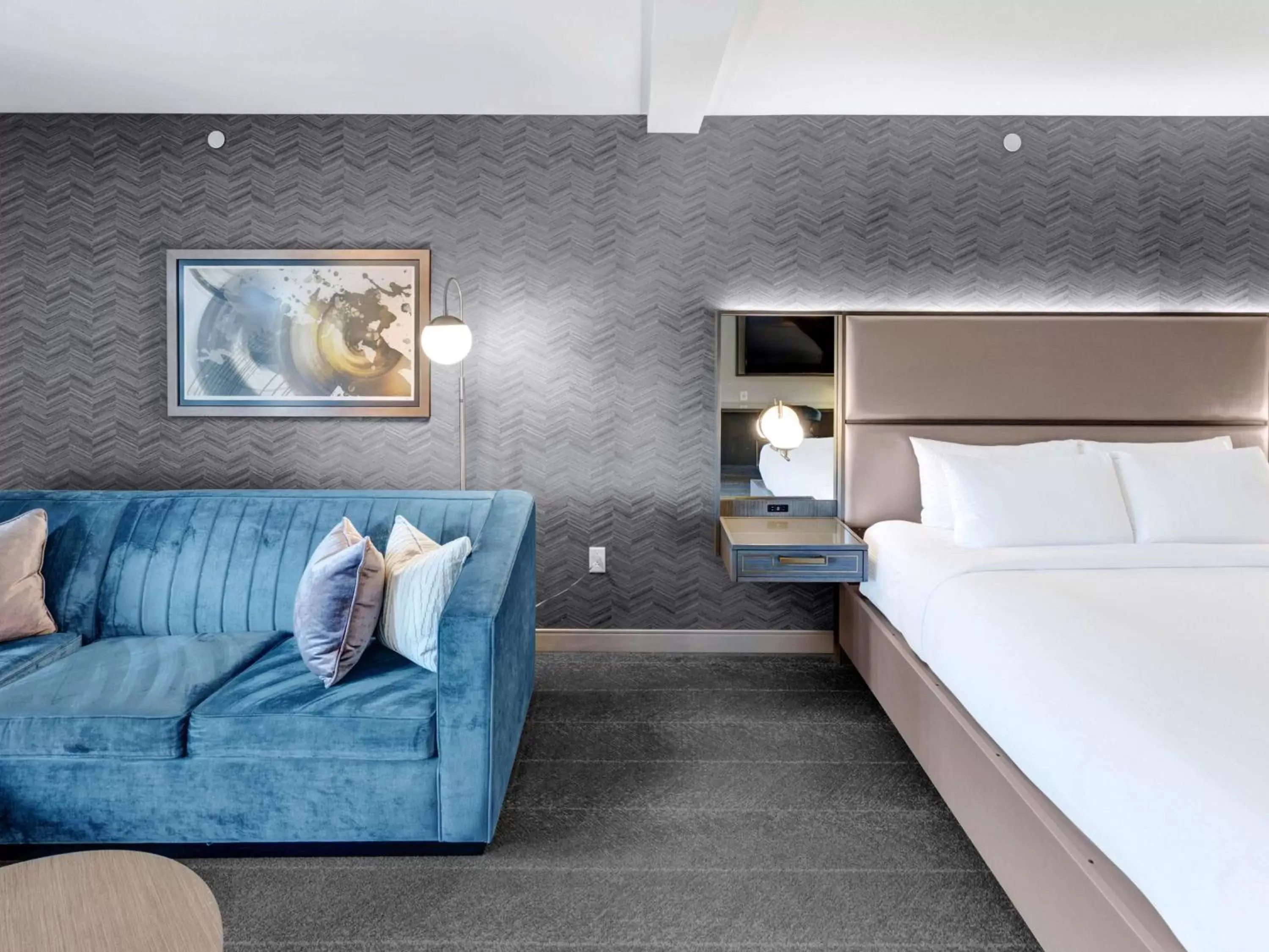 Living room, Bed in Tulsa Club Hotel Curio Collection By Hilton Living room, Bed in Tulsa Club Hotel Curio Collection By Hilton