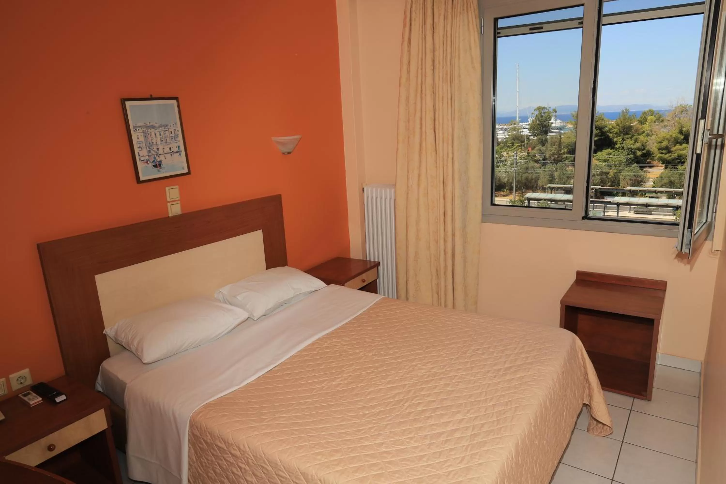 Bed in IKAROS Hotel ELLINIKO