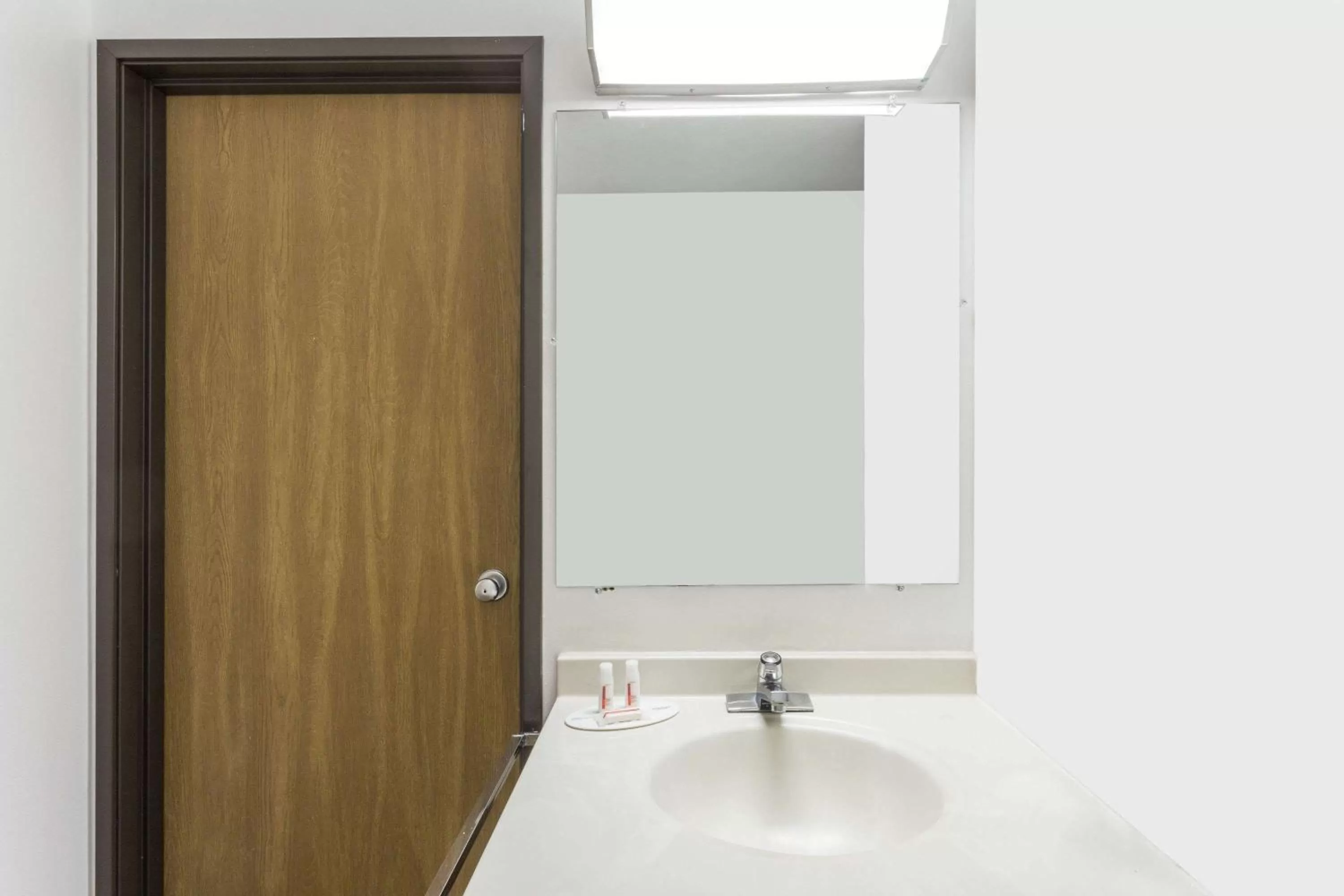 Bathroom in Super 8 by Wyndham Logan