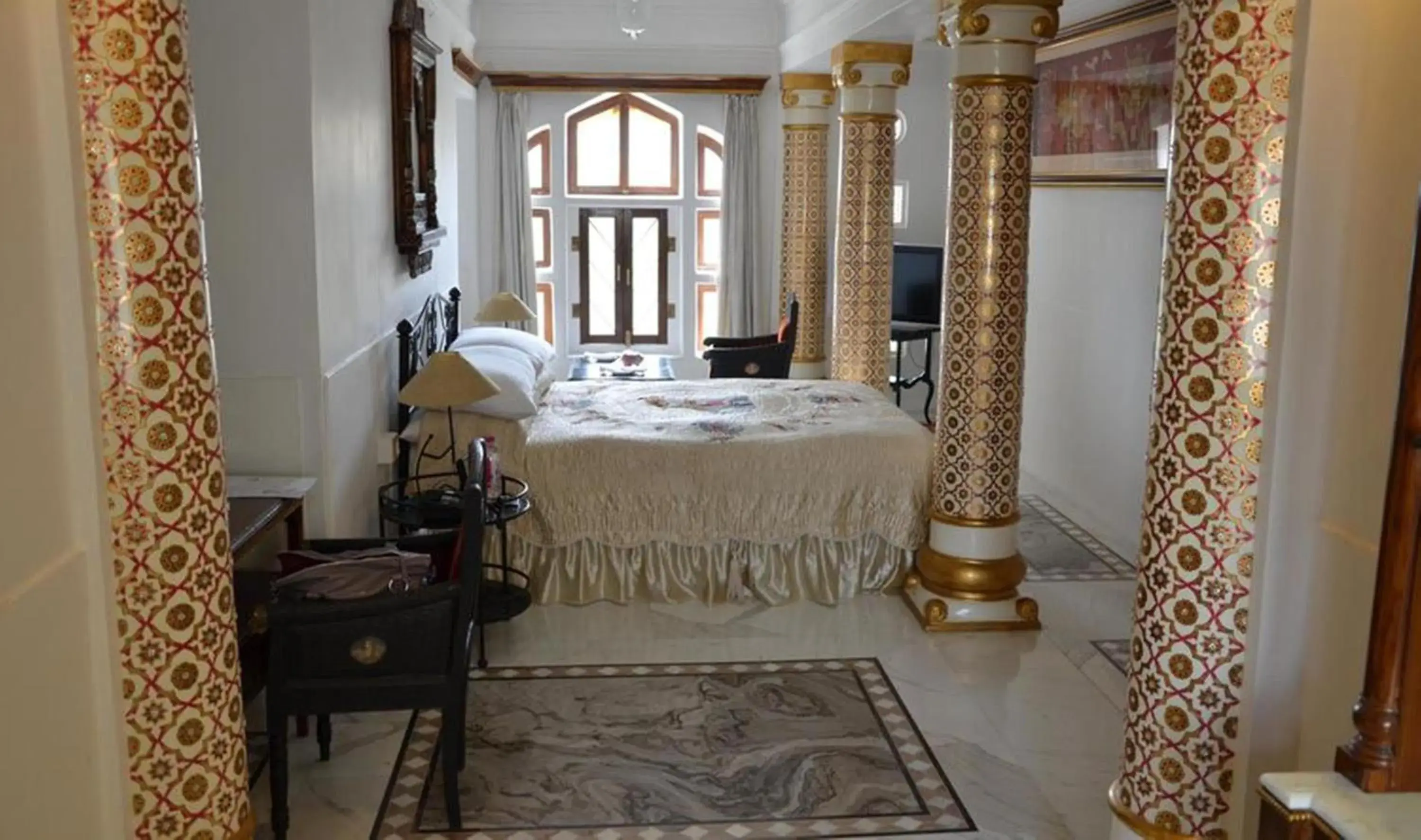 Bed in The Raj Palace (Small Luxury Hotels of the World)