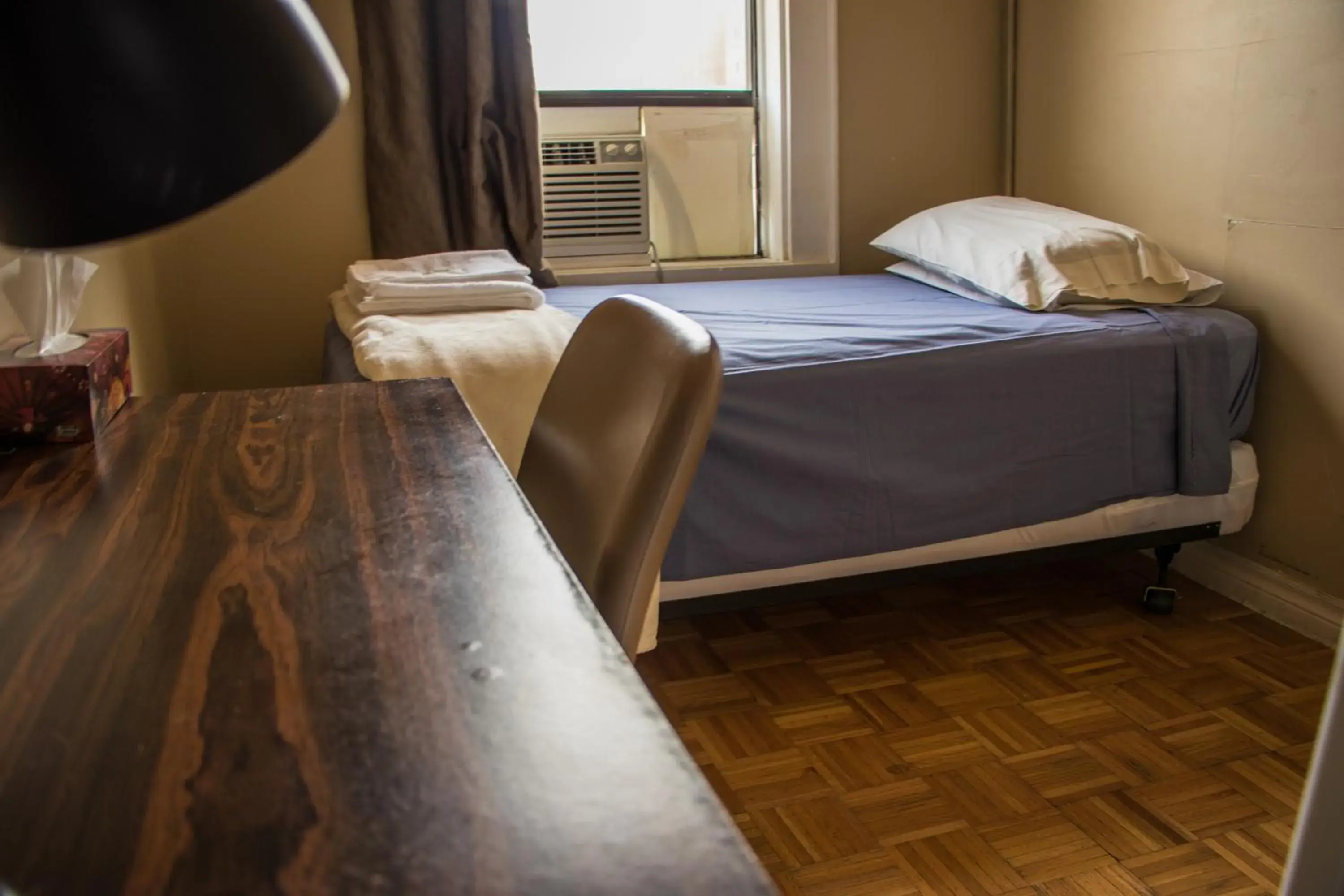 Bed in Saint Lawrence Residences and Suites