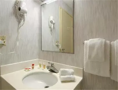 Bathroom in Super 8 by Wyndham West Haven