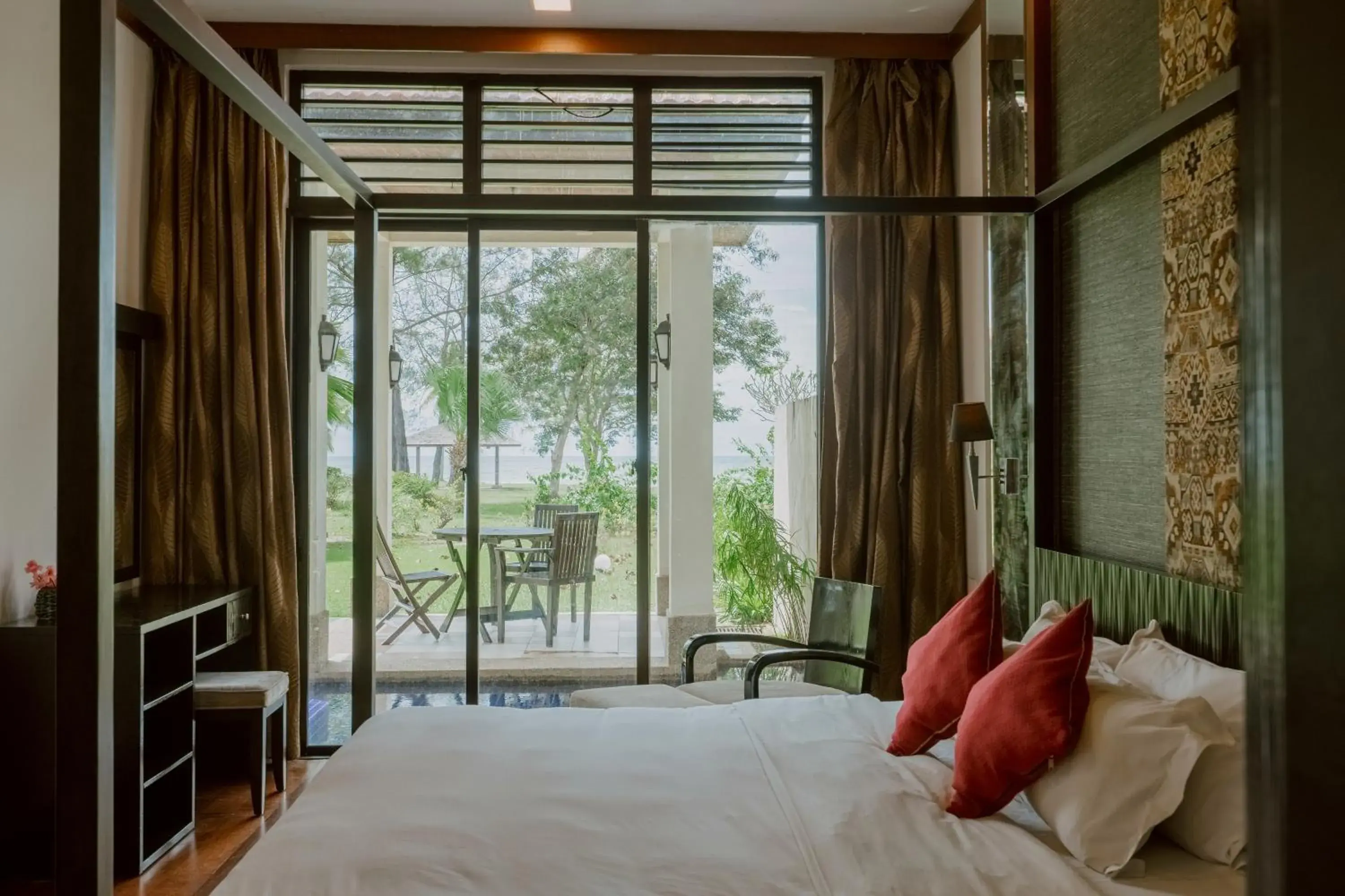 View (from property/room), Bed in Borneo Beach Villas