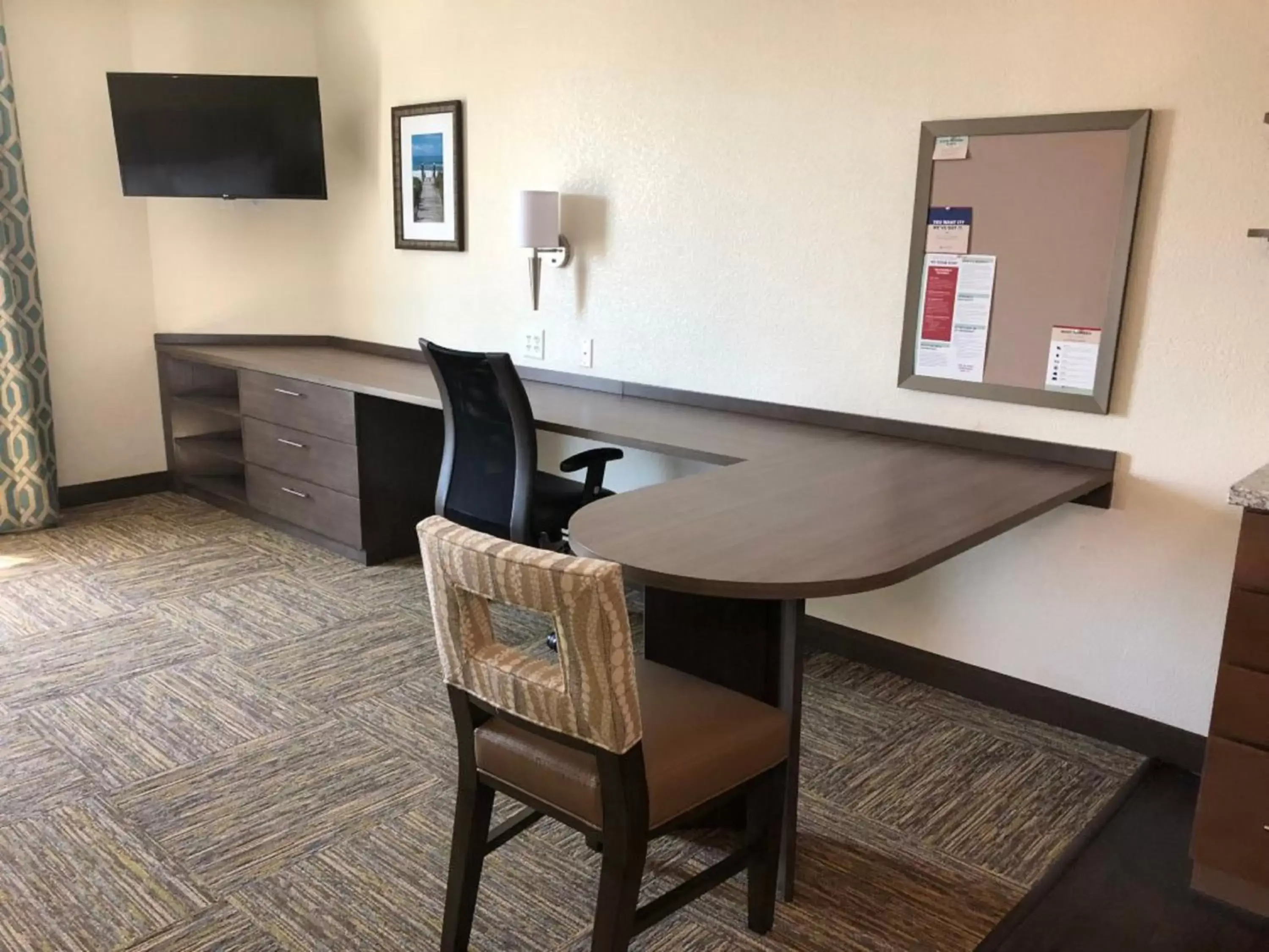 Photo of the whole room, TV/Entertainment Center in Candlewood Suites - Panama City Beach Pier Park, an IHG Hotel