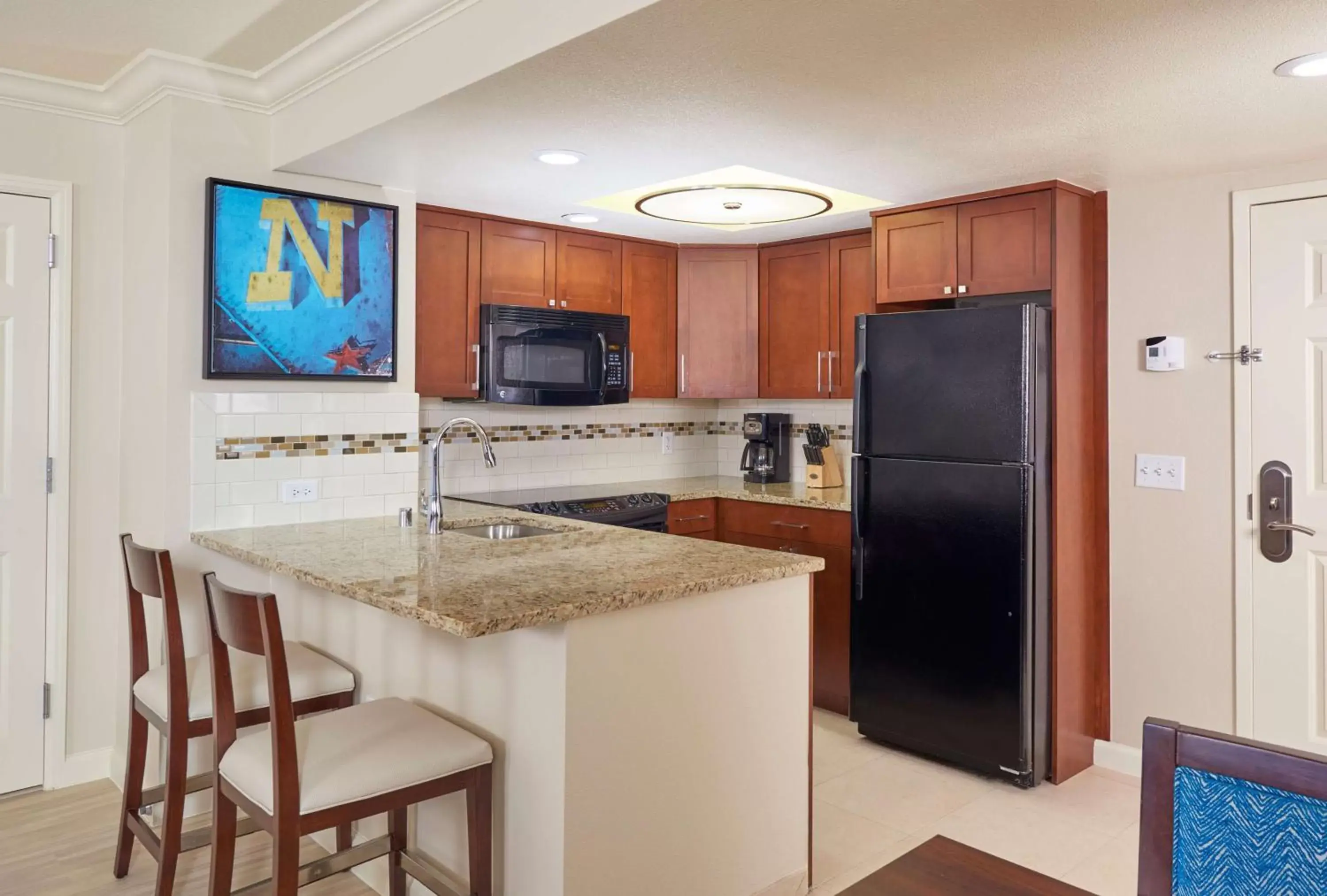 Bedroom, Kitchen/Kitchenette in Hilton Grand Vacations Club Paradise Las Vegas