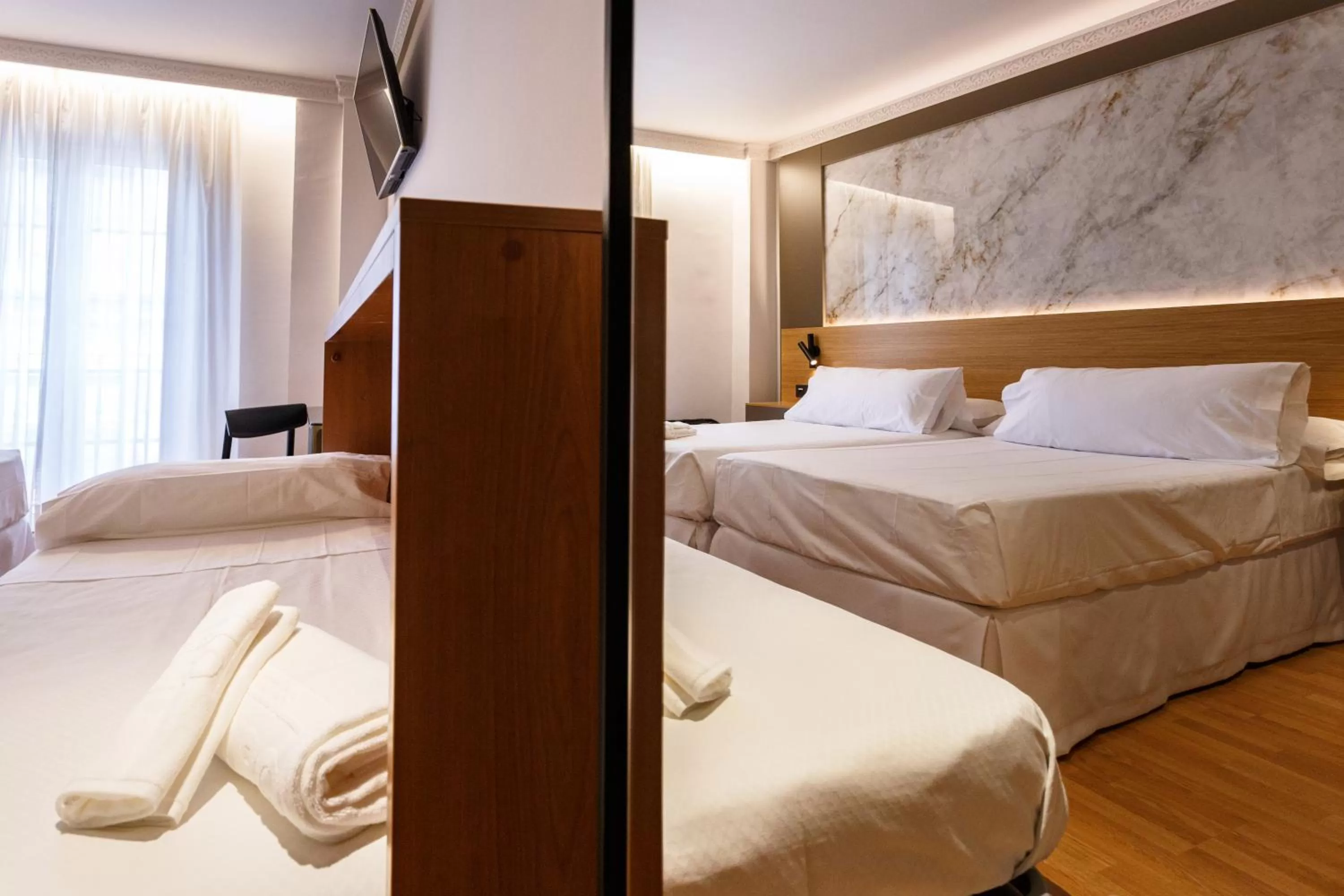 Bed in Hotel Dauro Premier