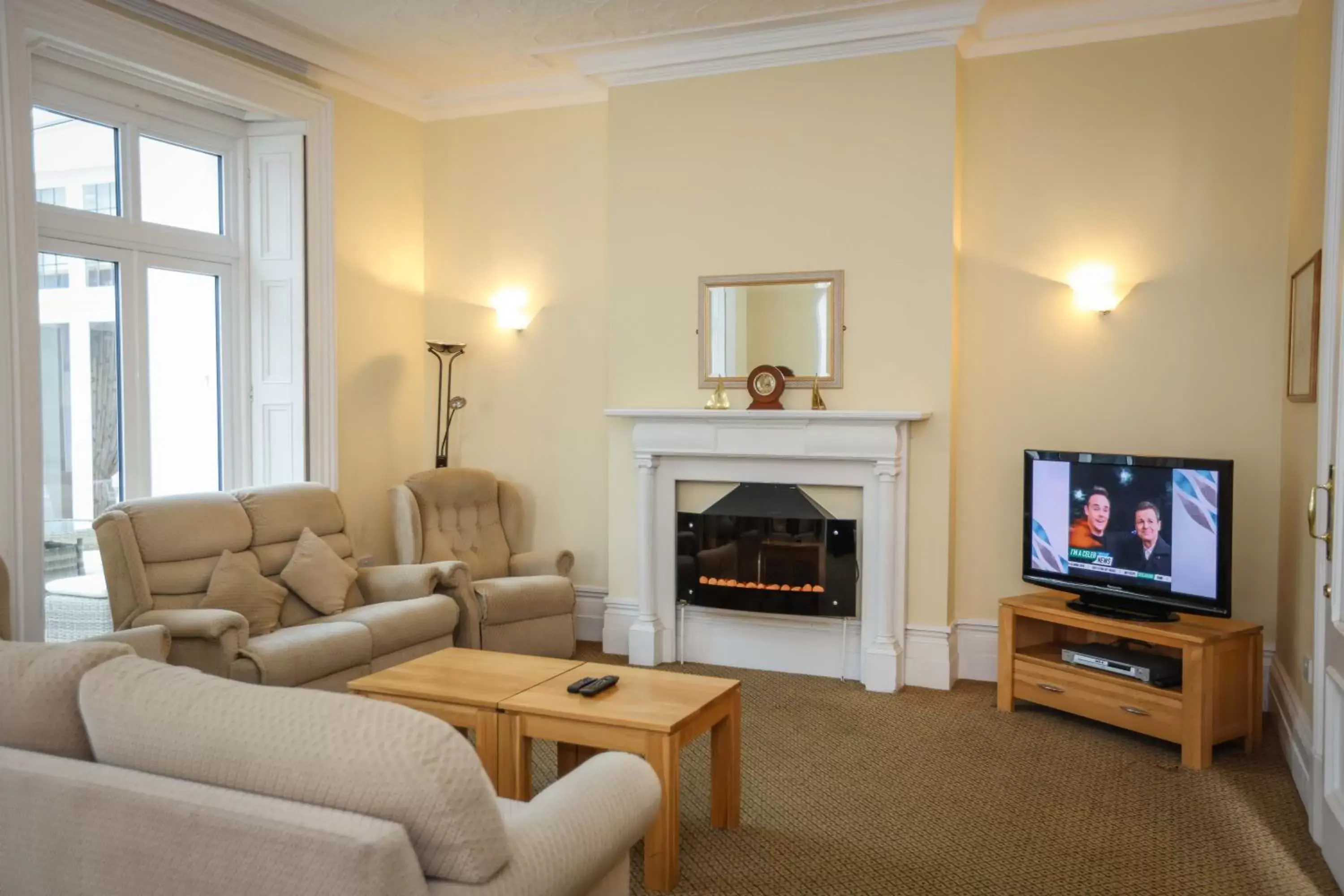 Communal lounge/ TV room, Seating Area in The Grove Hotel