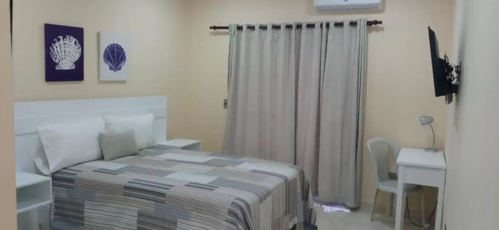 Bed in Apartahotel MACADANA