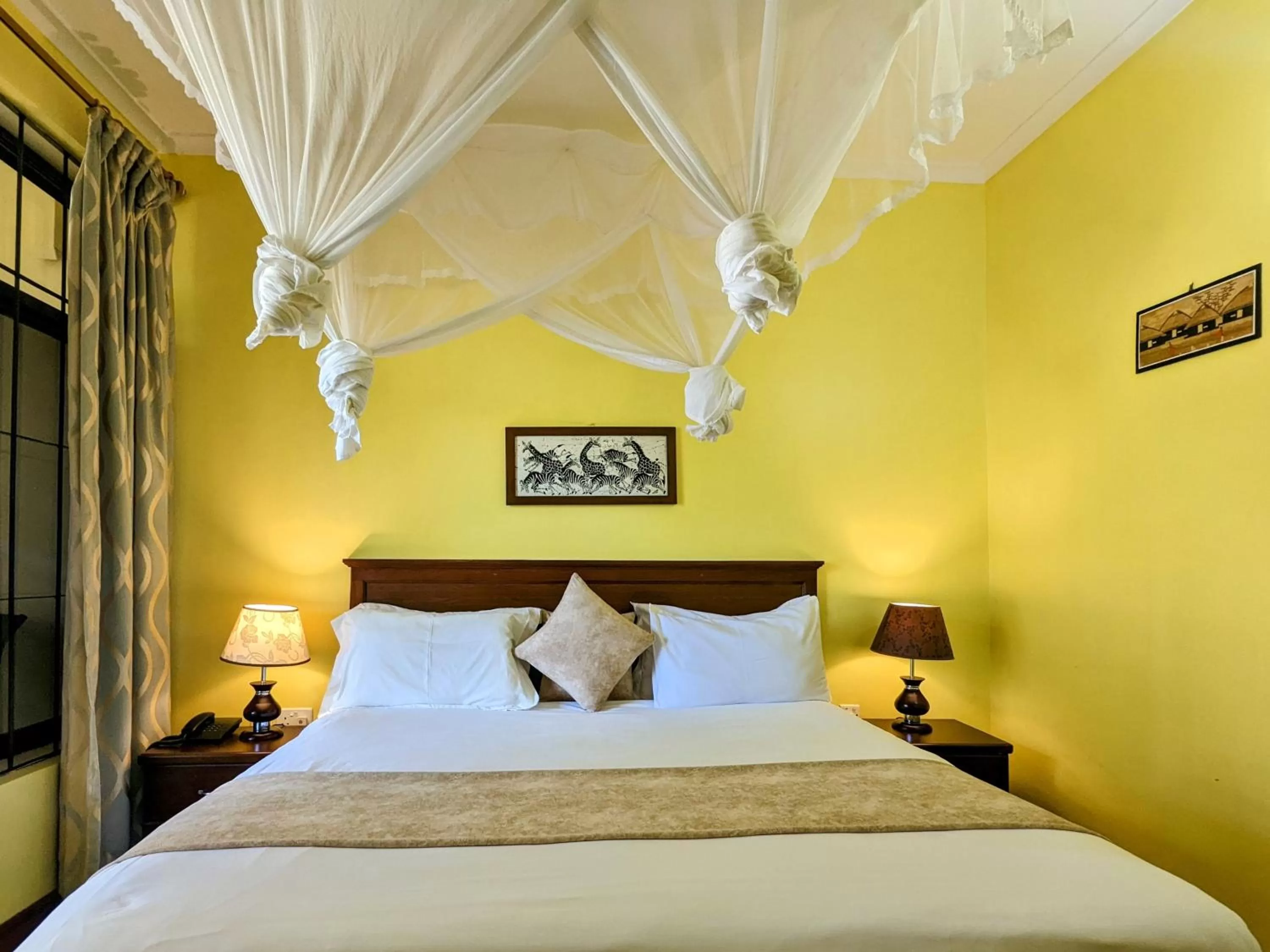 Bed in Mvuli Hotels Arusha