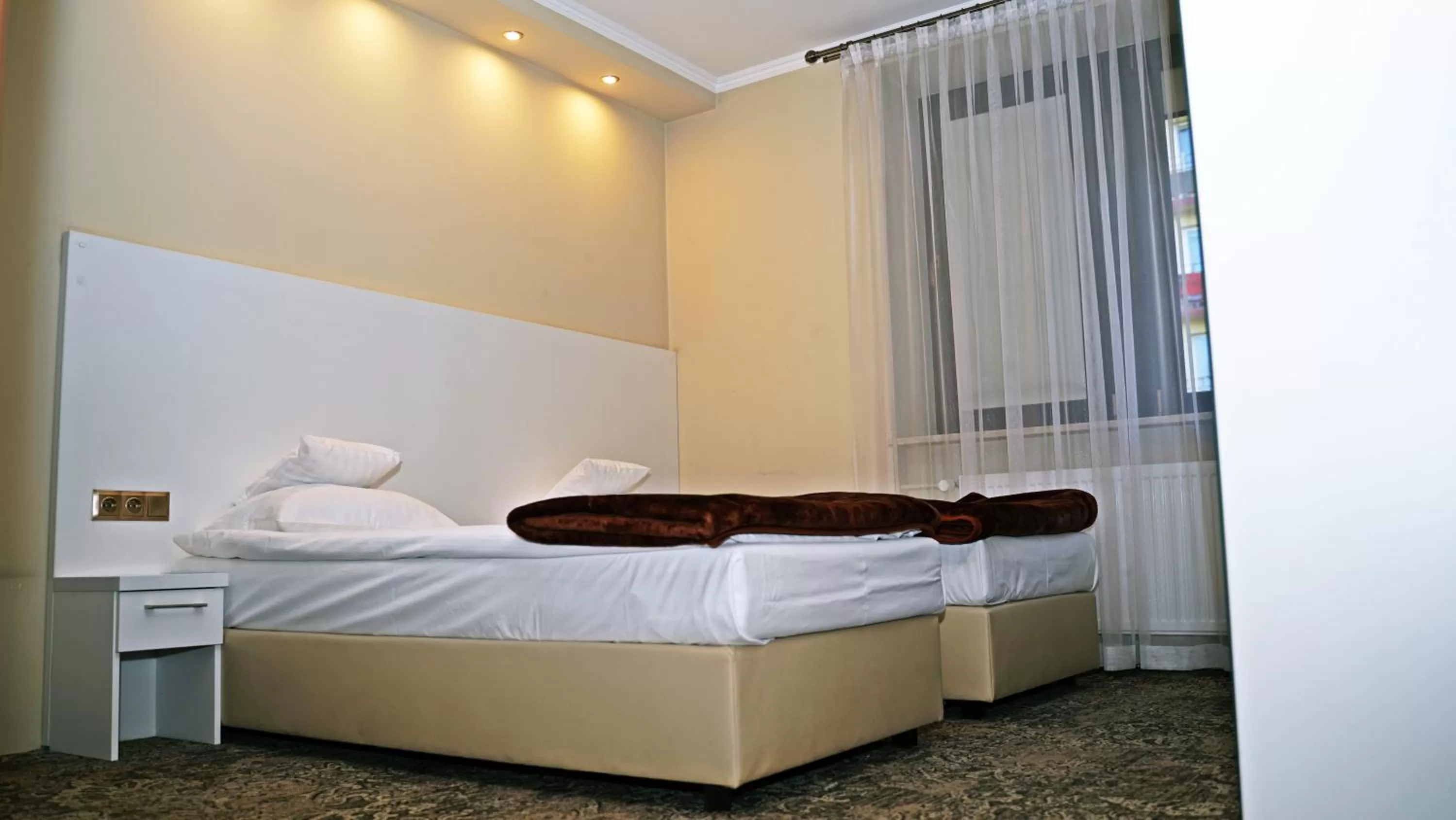 Bed in Hotel Promien