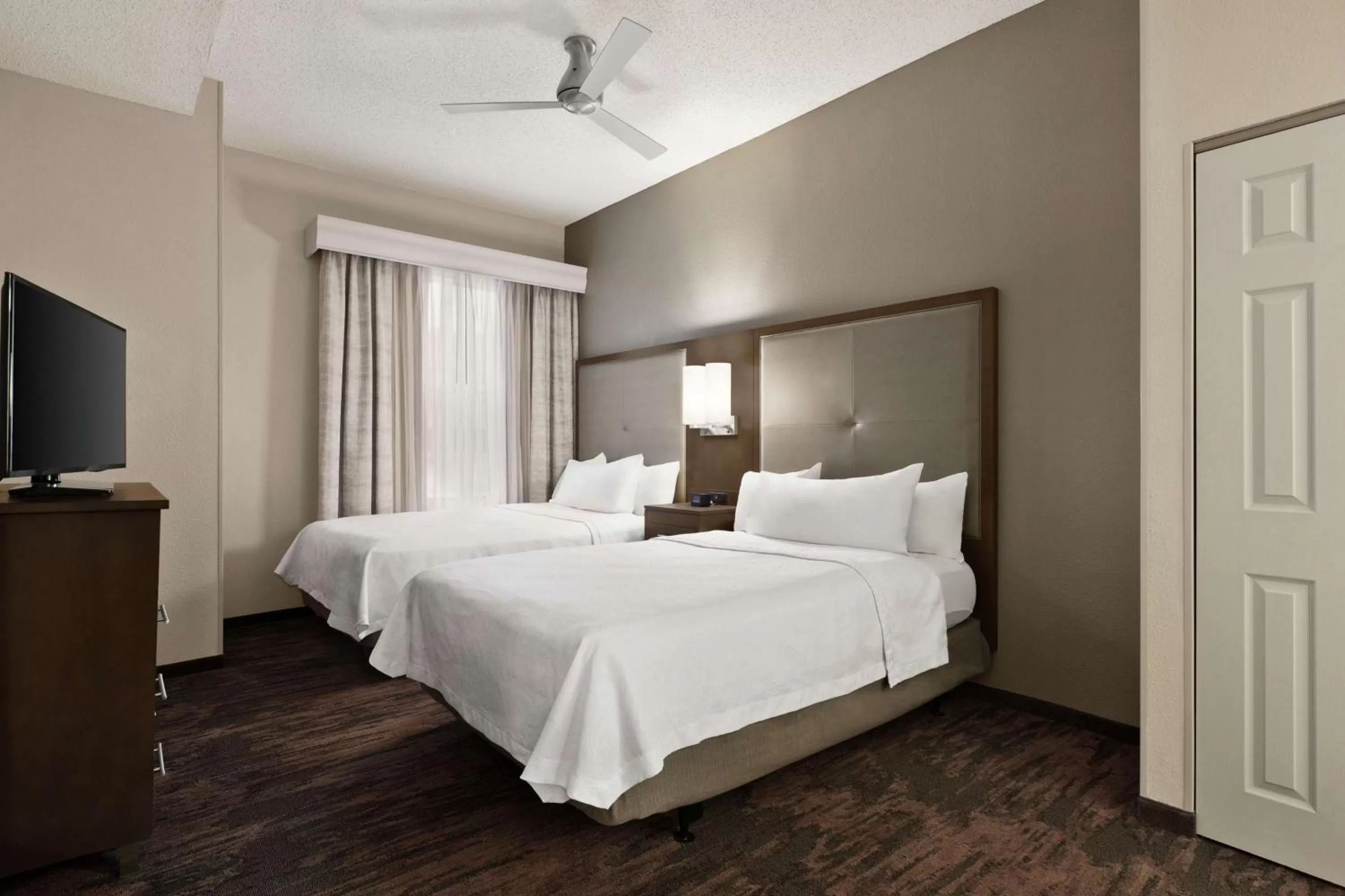Bed in Homewood Suites by Hilton Dallas-Plano