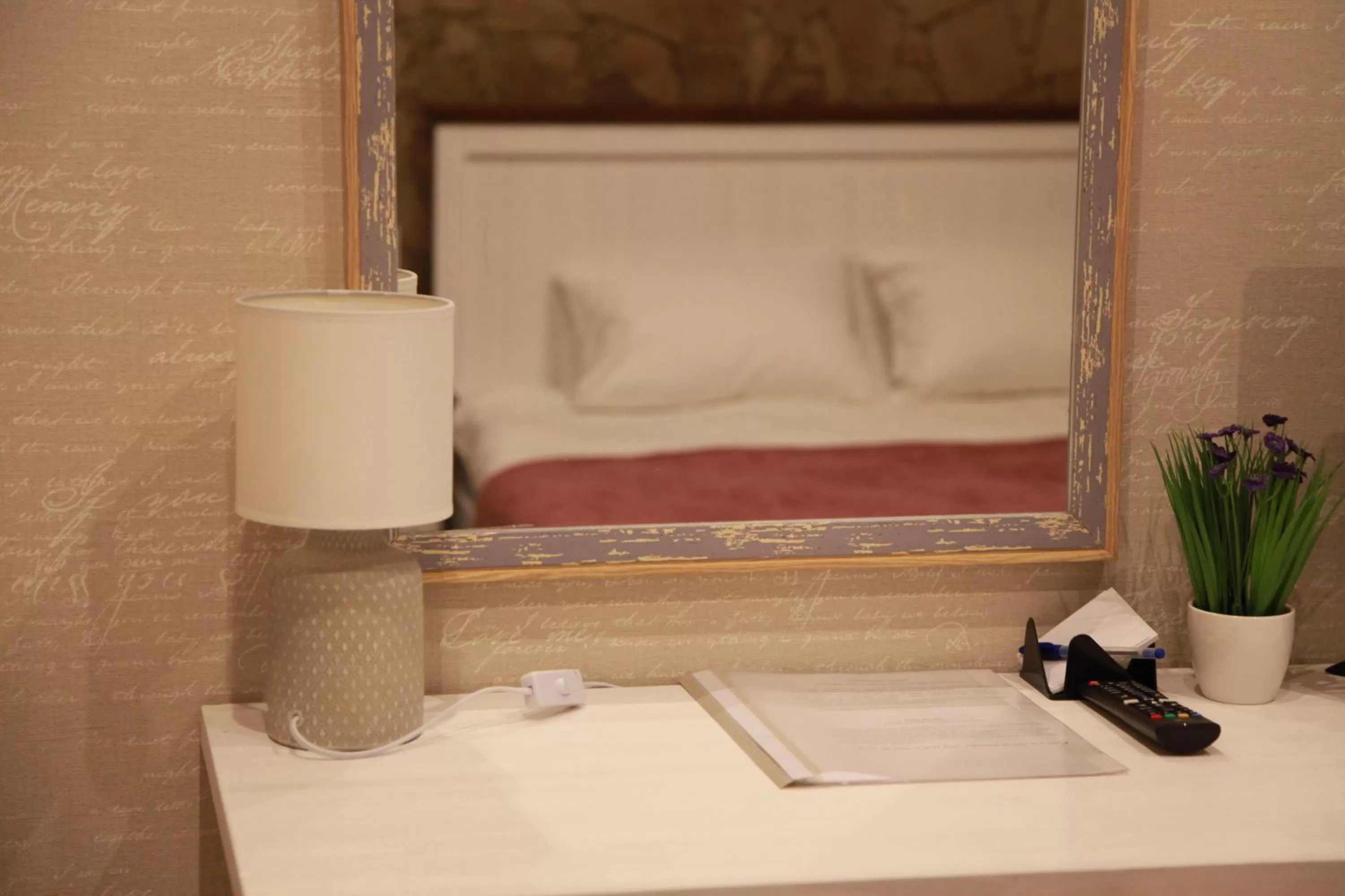 Bed in WINE & ROSE BOUTIQUE HOTEL