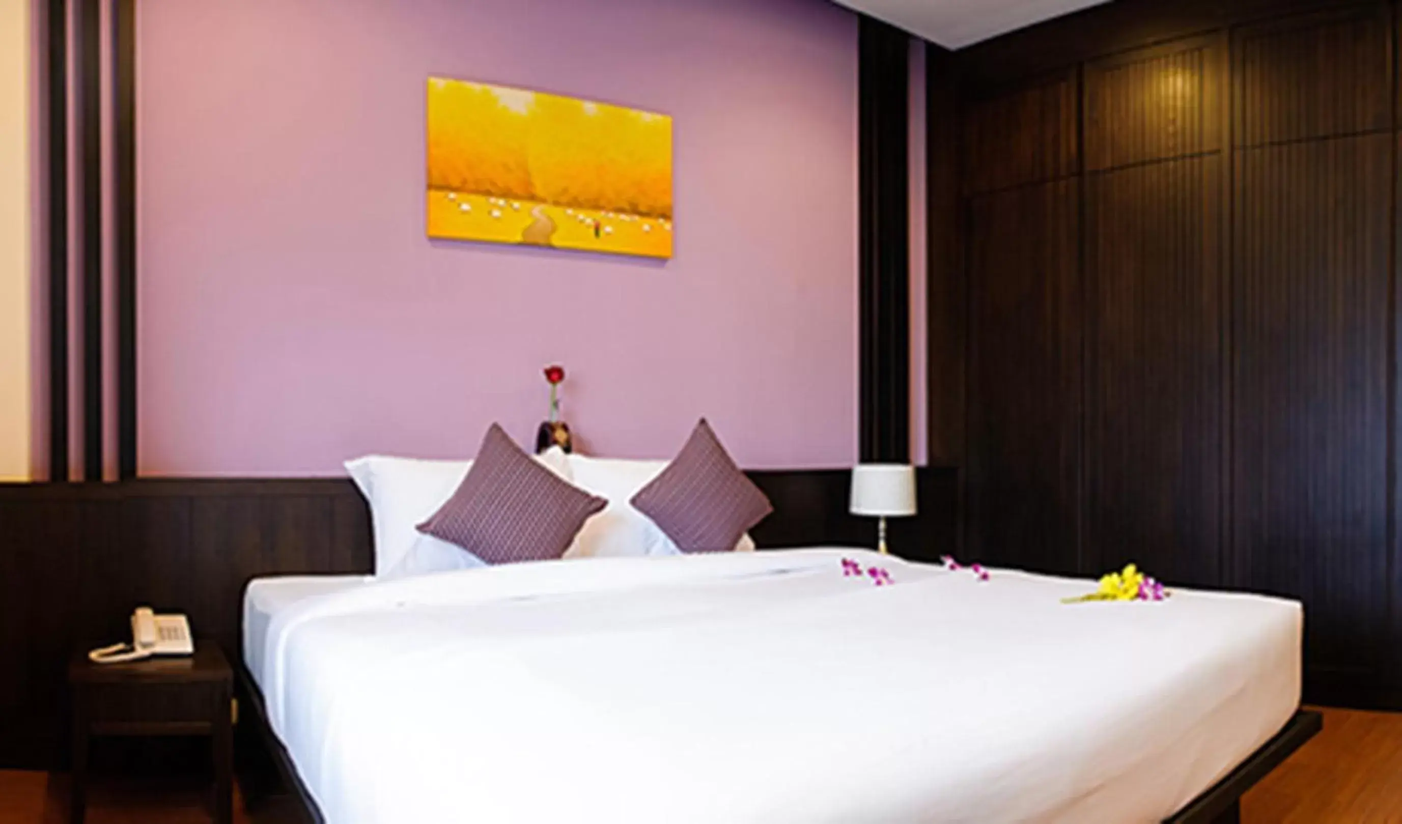 Bed in Tara Place Hotel Bangkok