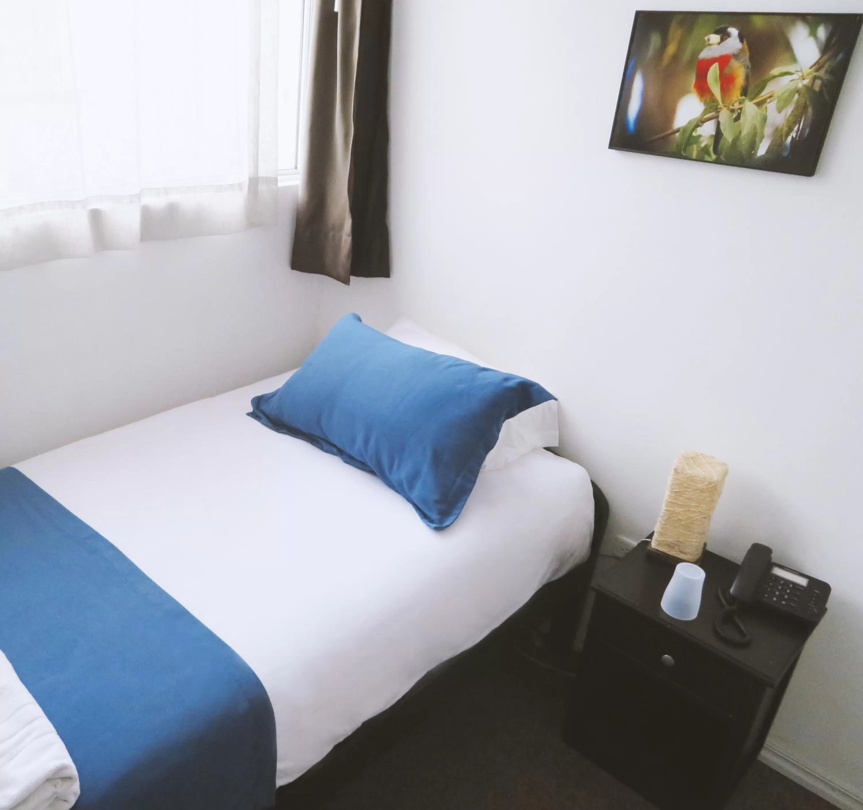 Bed in Bird Garden Guest House