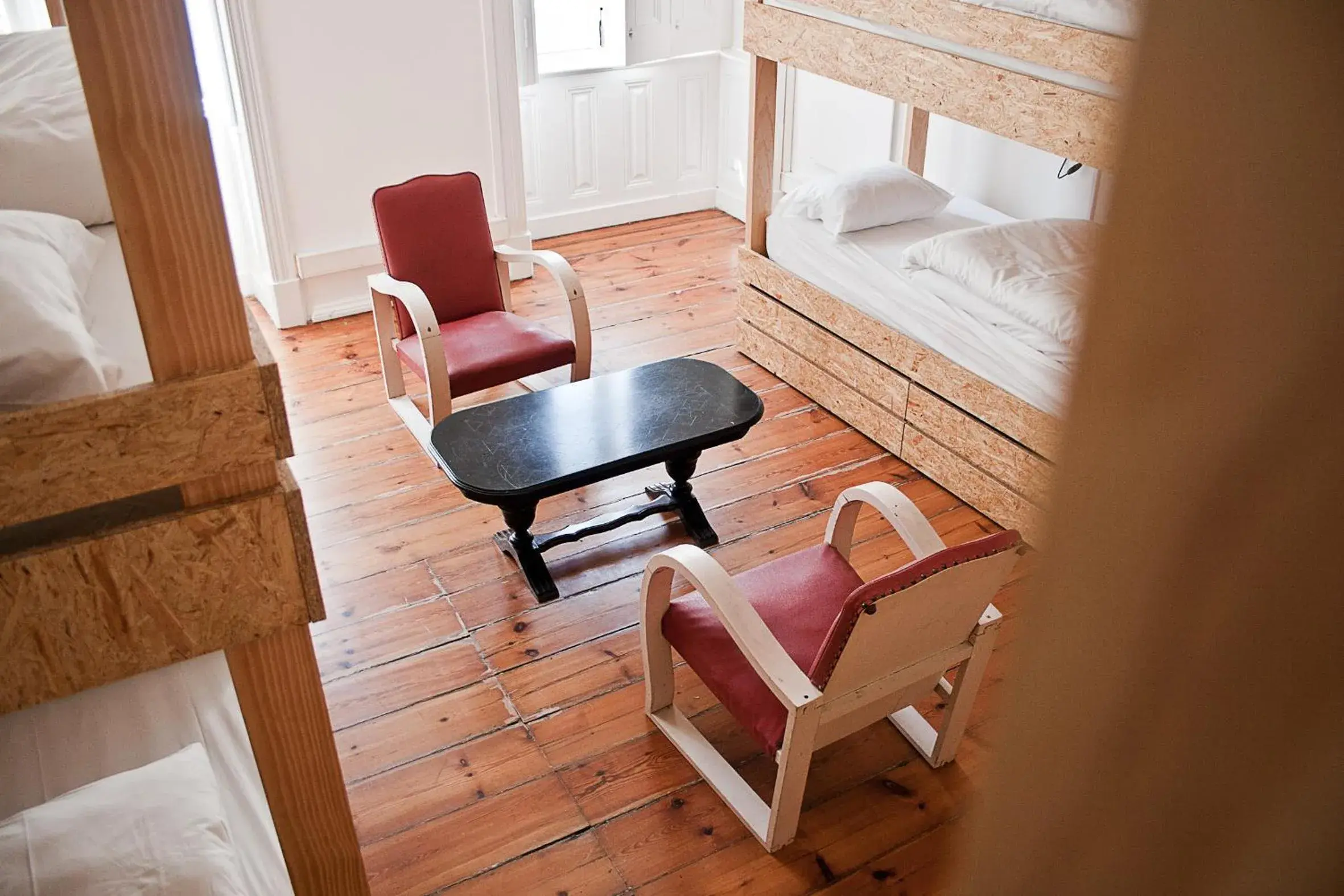 bunk bed, Seating Area in The Independente Hostel & Suites