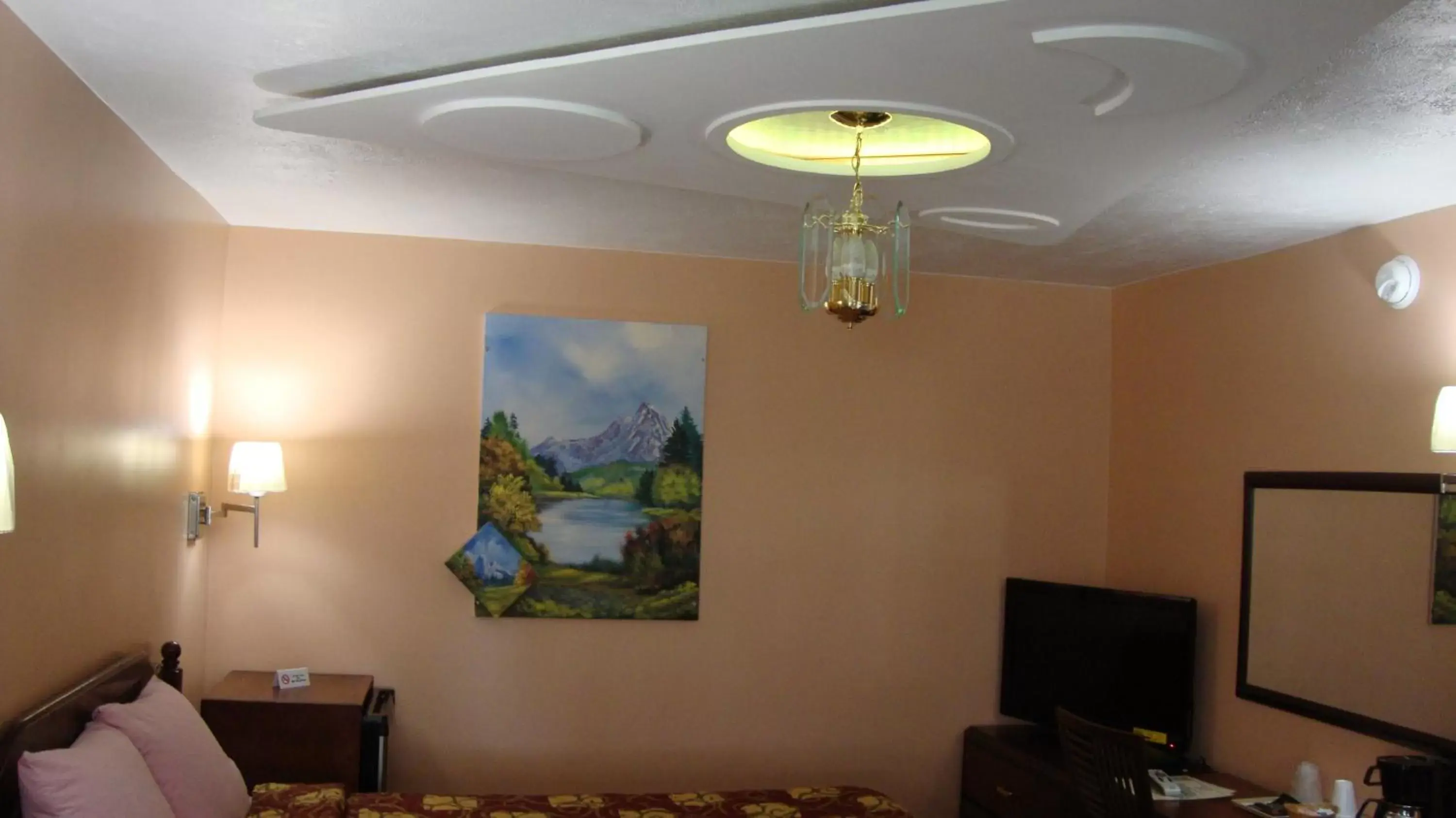 Decorative detail, TV/Entertainment Center in Pinconning Trail Inn Motel