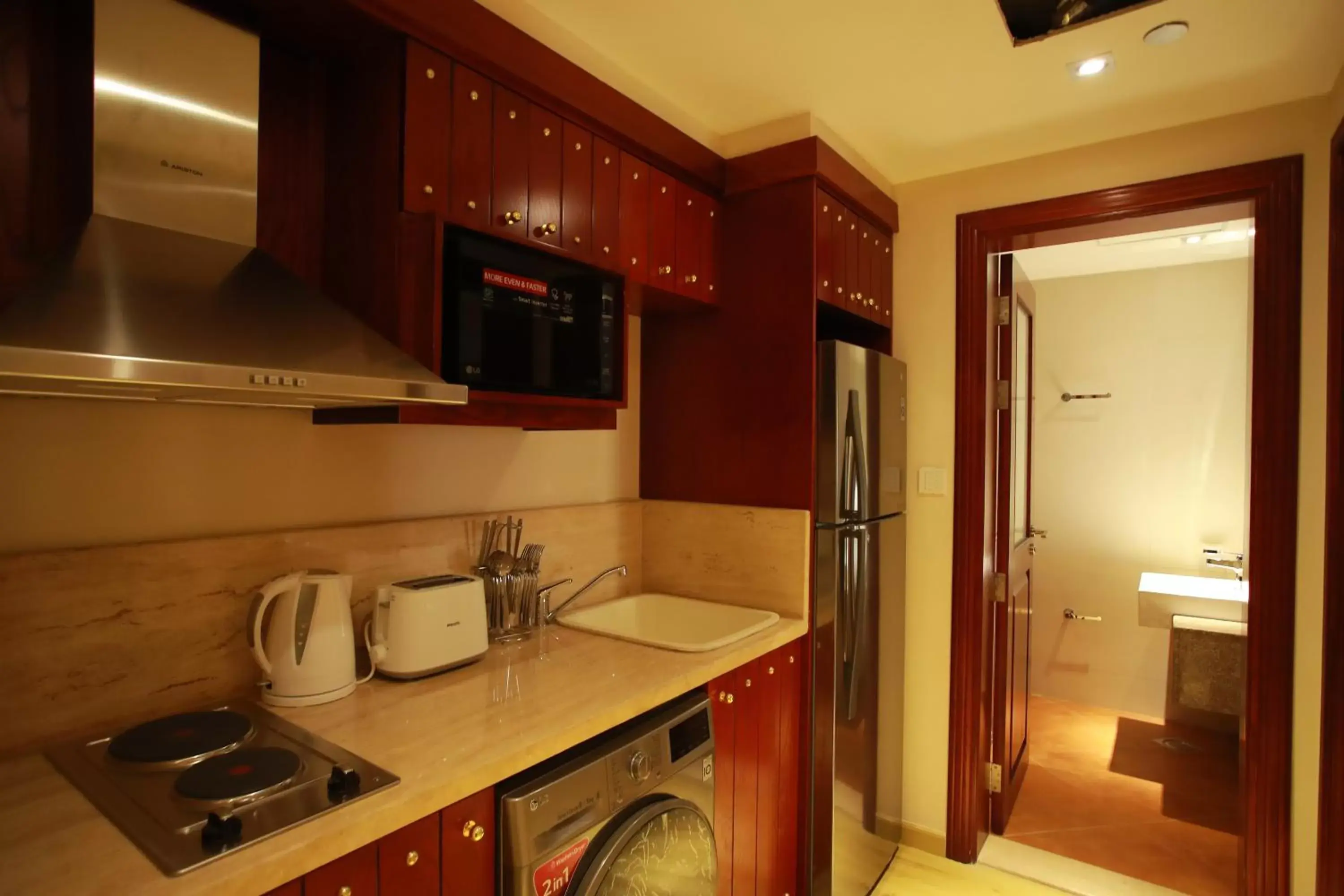 Kitchen or kitchenette, Kitchen/Kitchenette in Al Liwan Suites Rawdat Al Khail