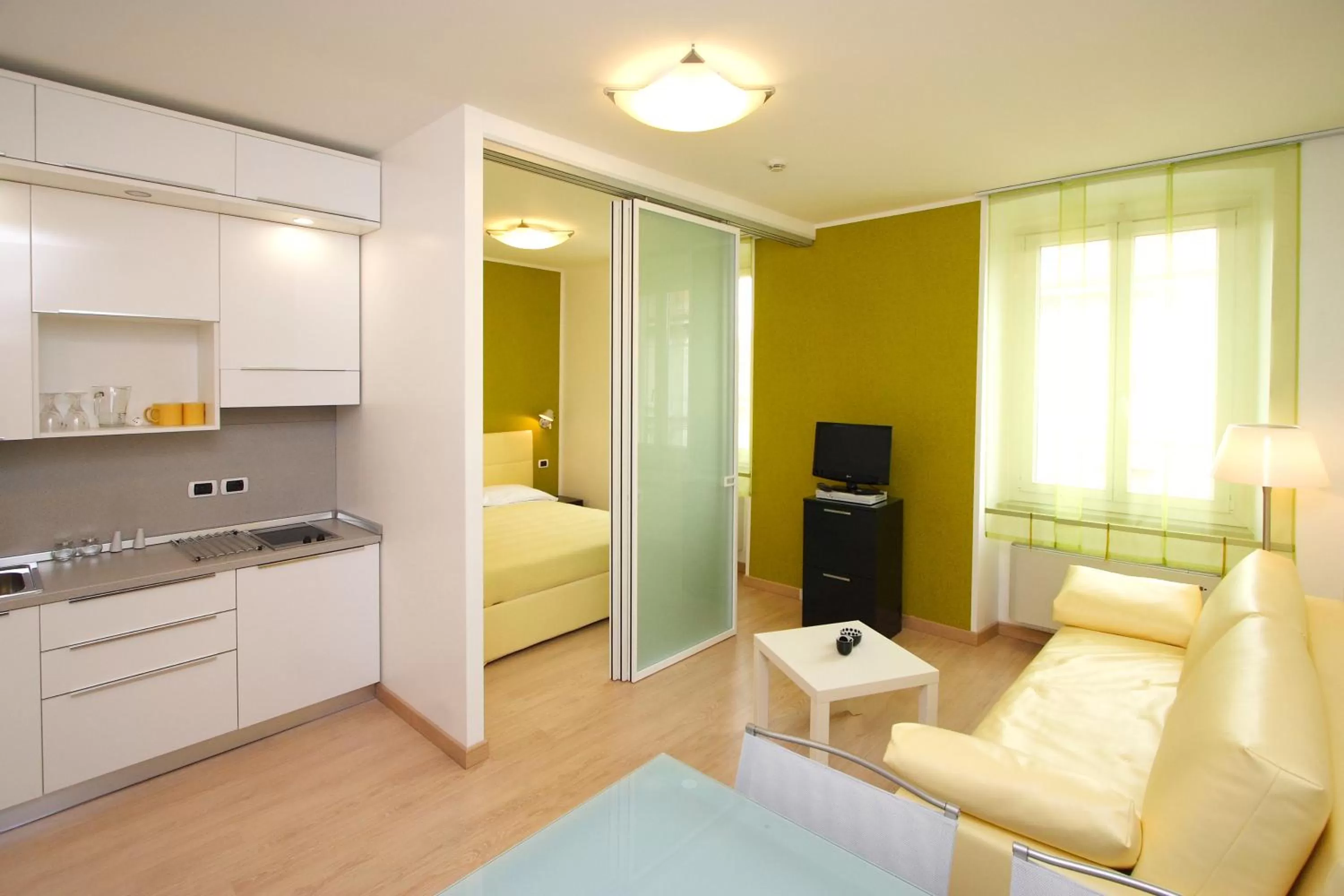 Living room, Bed in Hotel Roma