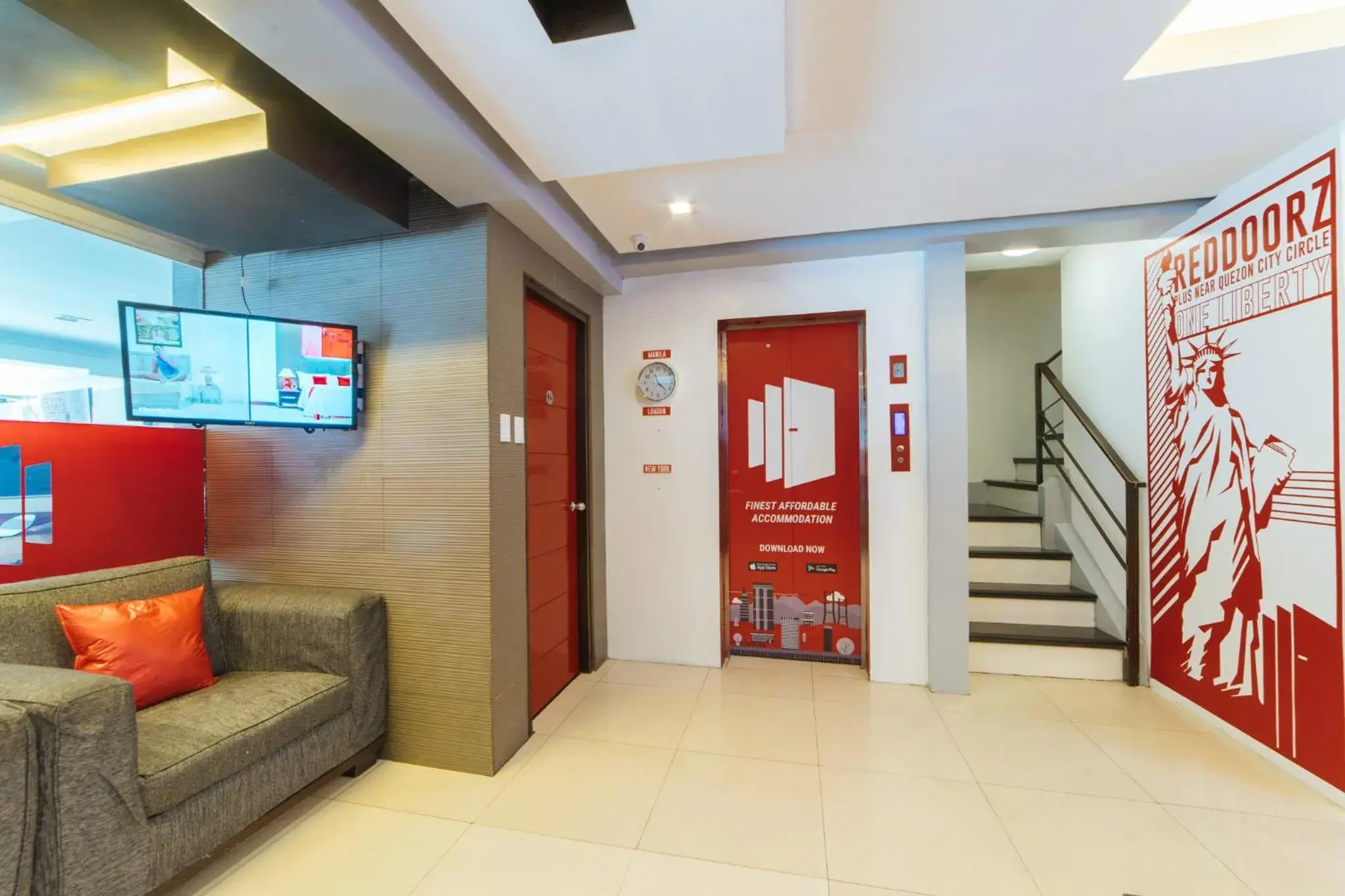 elevator, Lobby/Reception in RedDoorz Plus at One Liberty Hotel Kalayaan Avenue