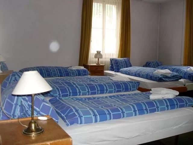 Bed in Hotel Quellenhof