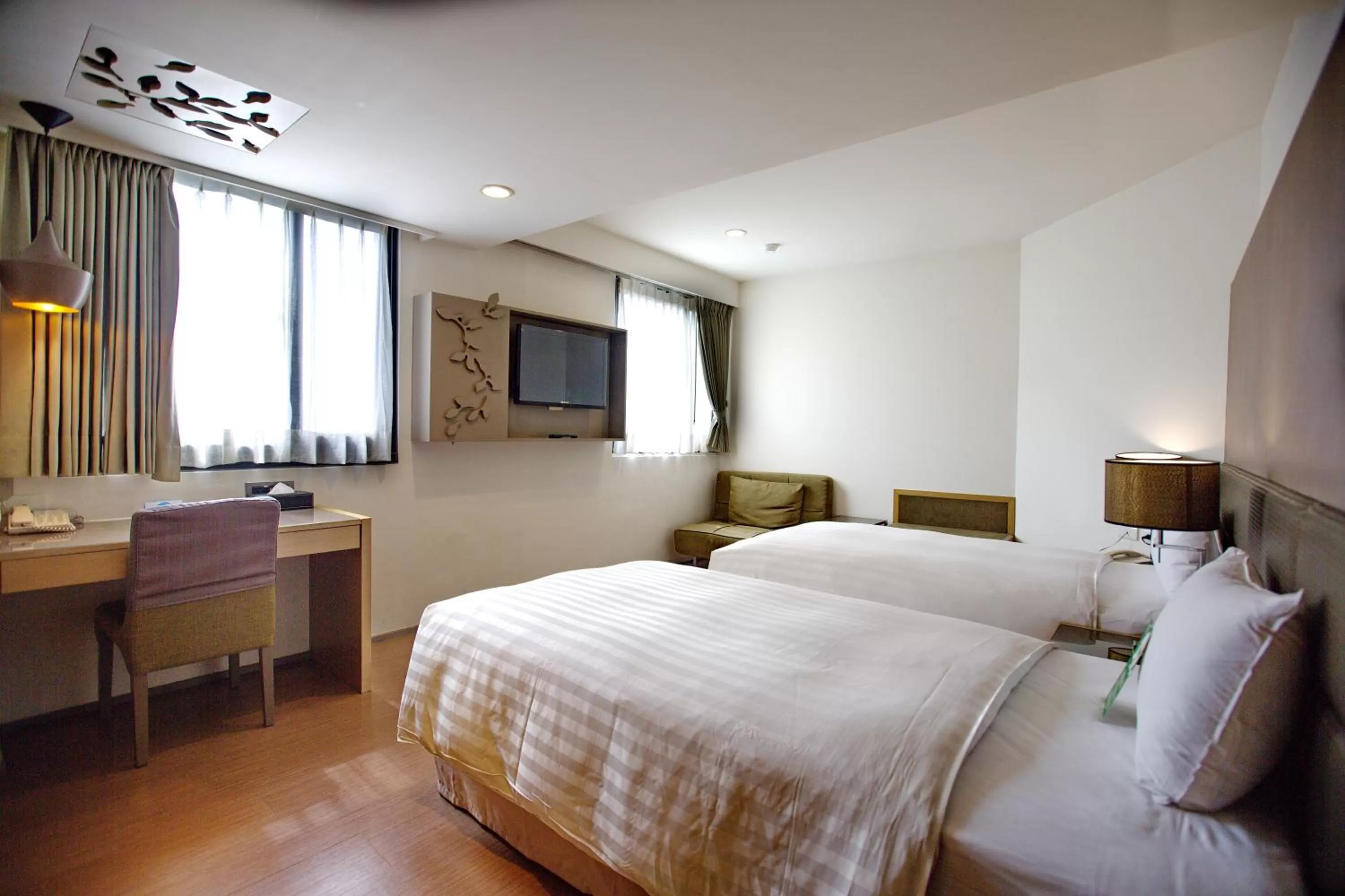 Bed in Shin Yuan Park Hotel