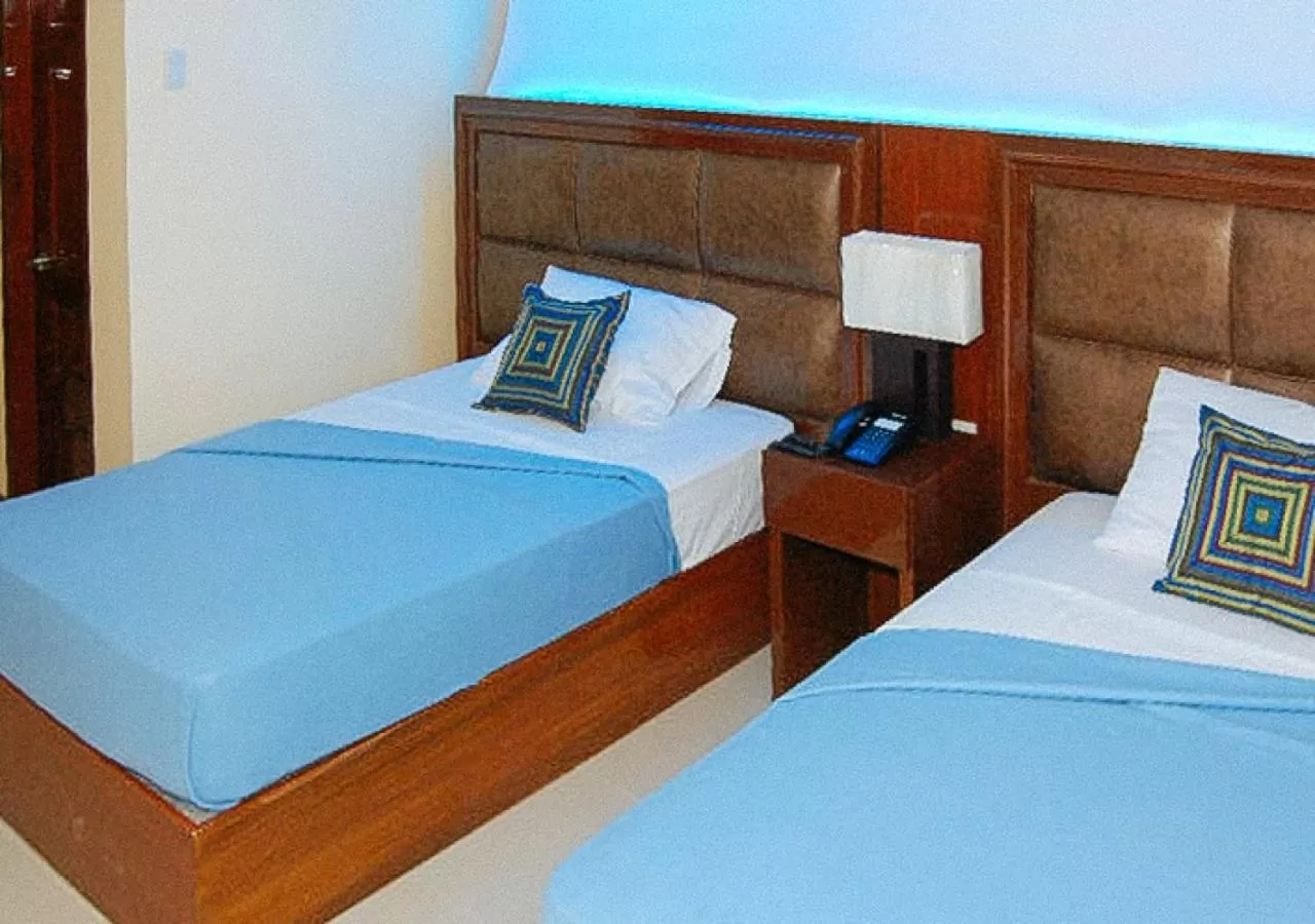 Bedroom, Bed in Sky Garden Hotel by RedDoorz